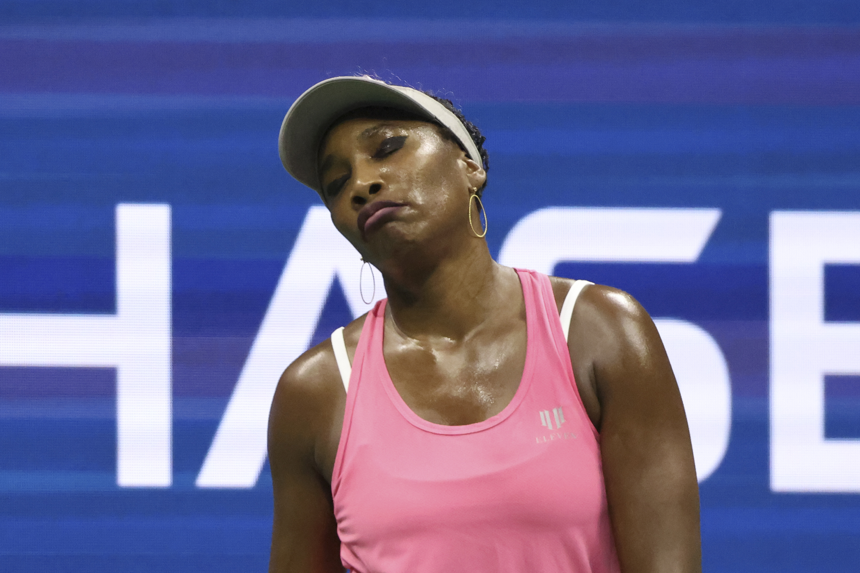 US tennis legend Venus Williams cut a glum figure after she was hosed by Germany's Greet Minnen in the first round of this year's final grand slam.