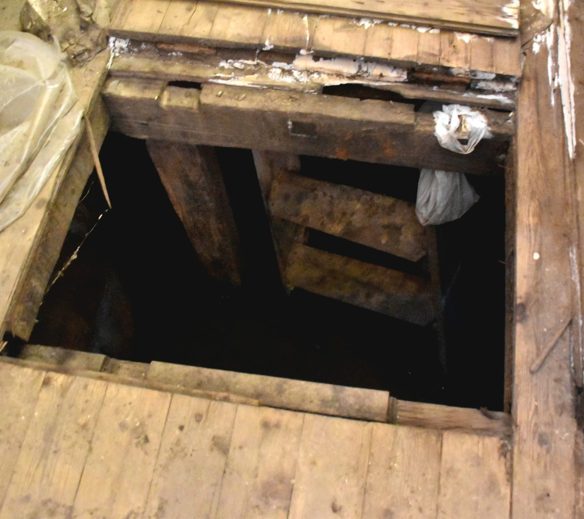 An open cellar found behind the counter of the general store.