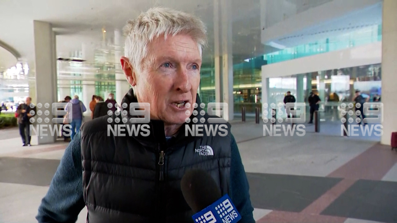 Gary Hallissey was sitting down, waiting to collect his son inside the terminal, when he heard "three or four" shots.