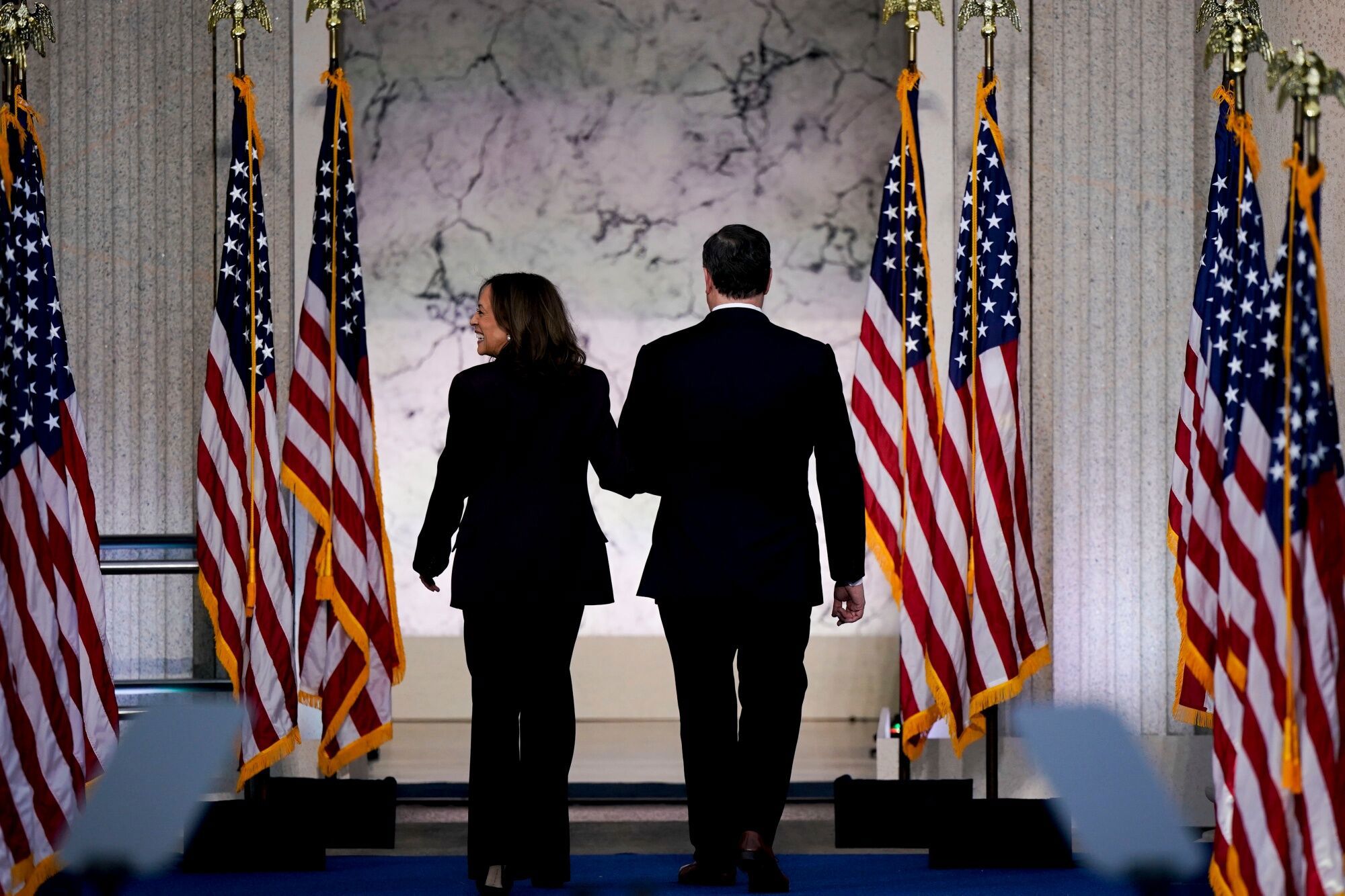 US Vice President Kamala Harris, left, and US Second Gentleman Doug Emhoff at Howard University in Washington, DC, US, on Wednesday, Nov. 6, 2024. Kamala Harris has called Donald Trump to concede the election to the President-elect, a senior aide to the Vice President told Bloomberg. Photographer: Victor J. Blue/Bloomberg