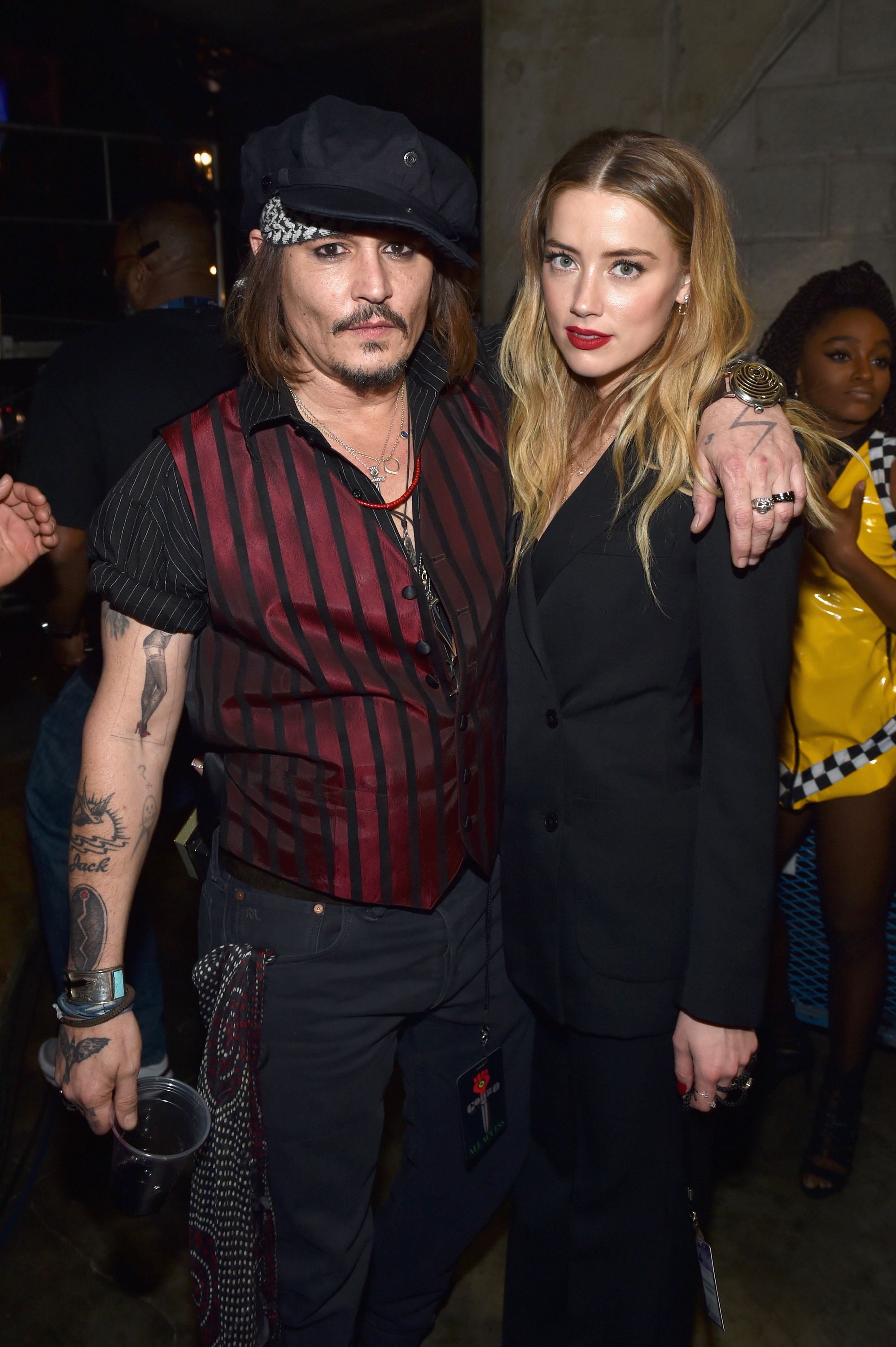 Johnny Depp and Amber Heard attends The 58th GRAMMY Awards at Staples Center on February 15, 2016 in Los Angeles, California.