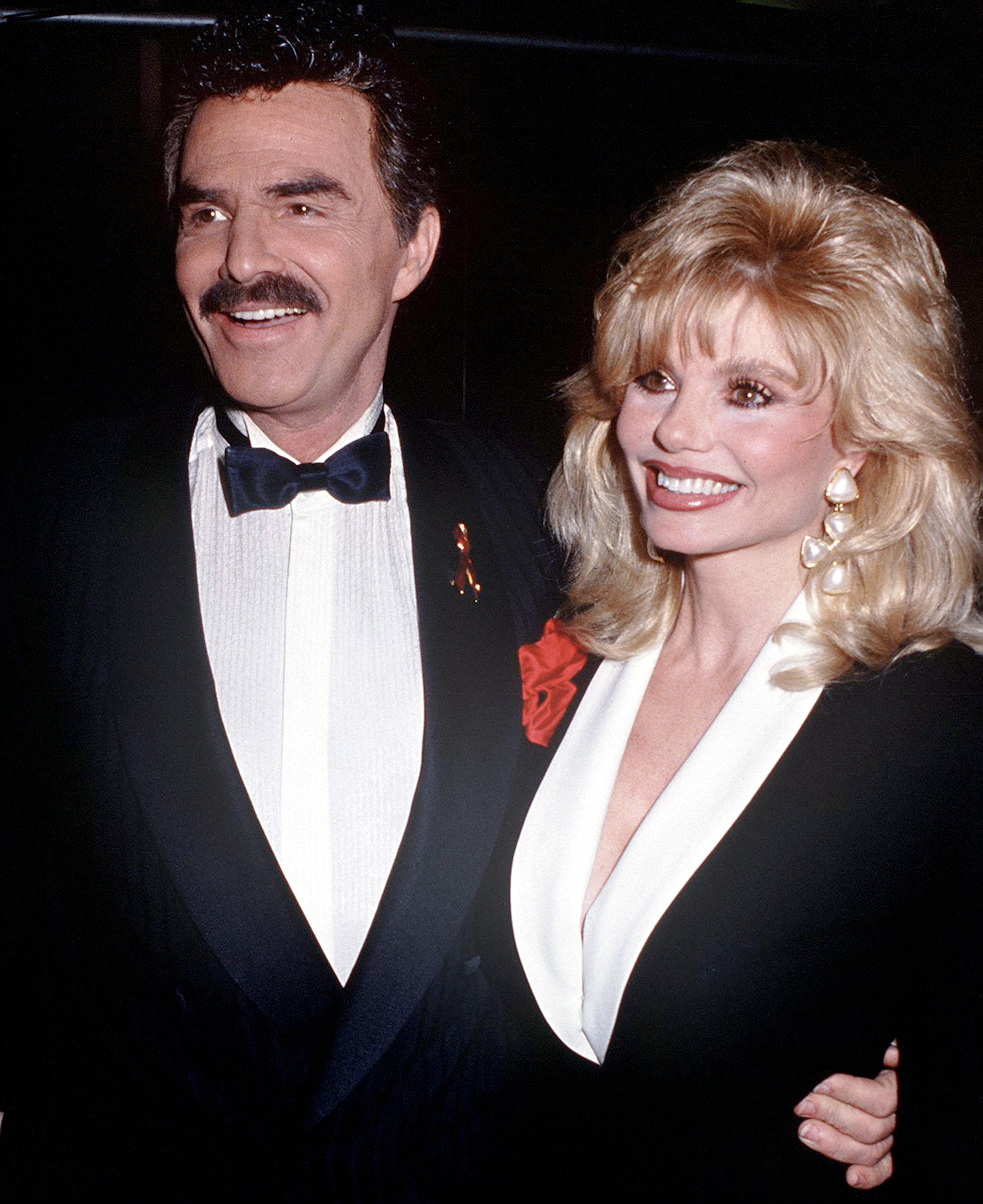 Burt Reynolds with actress Loni Anderson, then husband and wife, circa 1992.