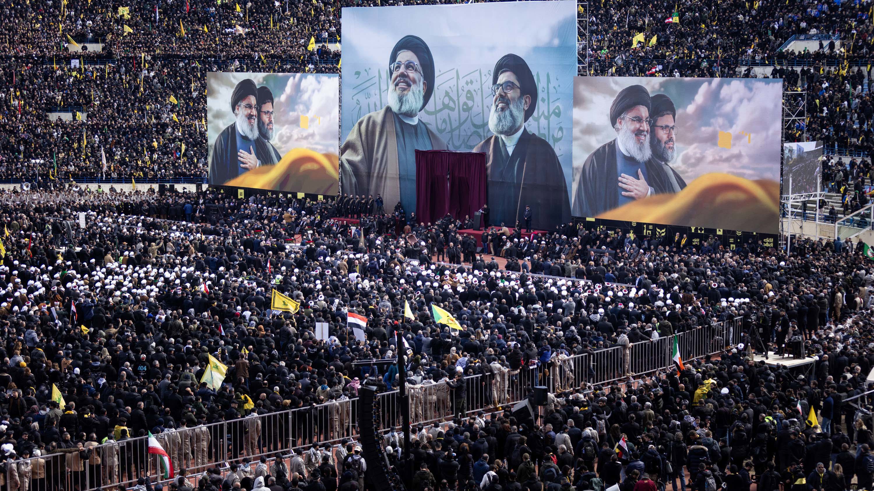Masses of mourners attend the funeral of Hezbollah leader