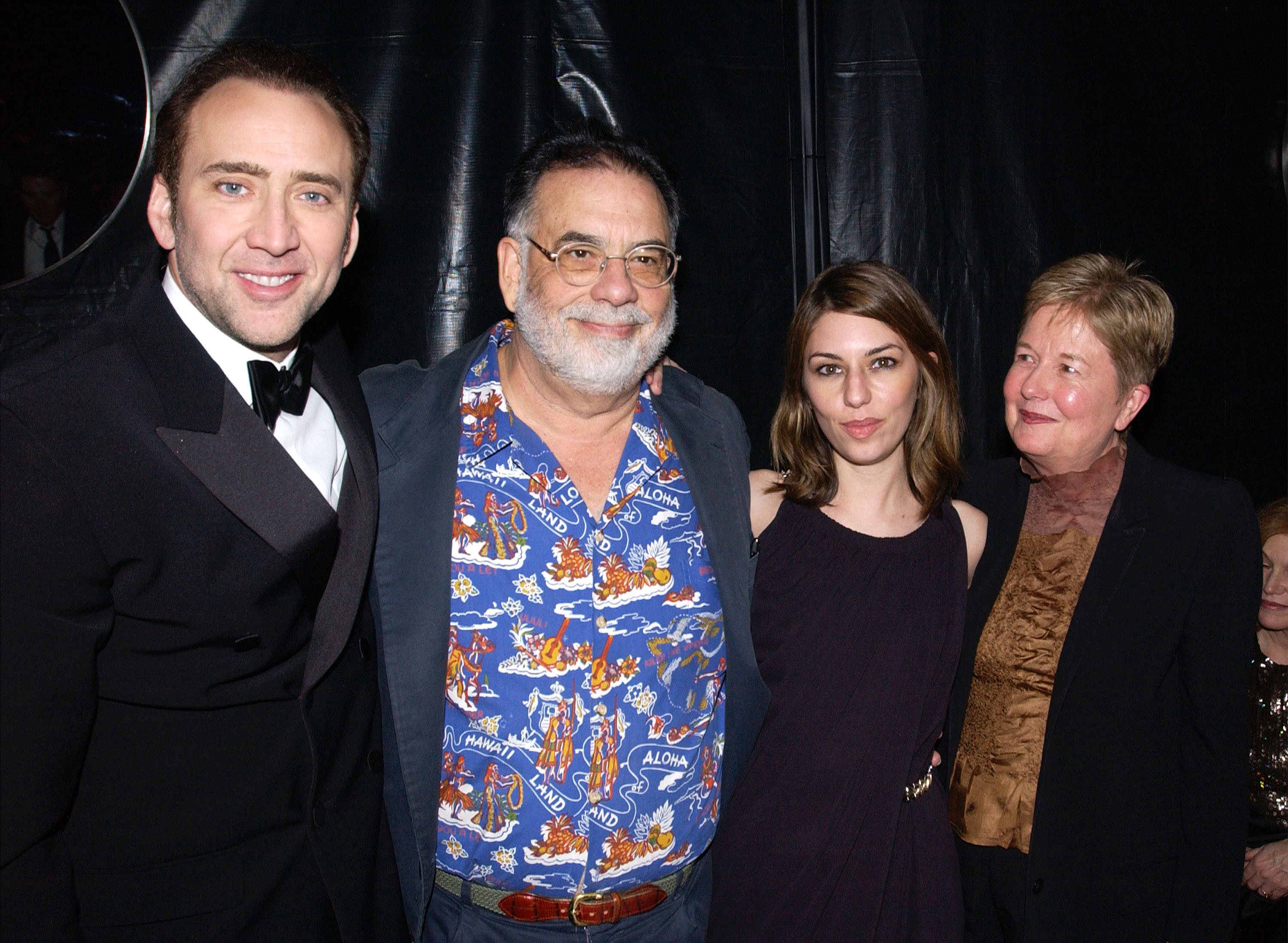   (U.S. TABS AND HOLLYWOOD REPORTER OUT)  (L-R)  Actor Nicolas Cage, director Francis Ford Coppola, his daughter, director Sofia Coppola and her mom Eleanor attend the Universal-Focus Features after-party during the 61st Annual Golden Globe Awards on January 25, 2004 in Beverly Hills, California. (Photo by Vince Bucci/Getty Images)