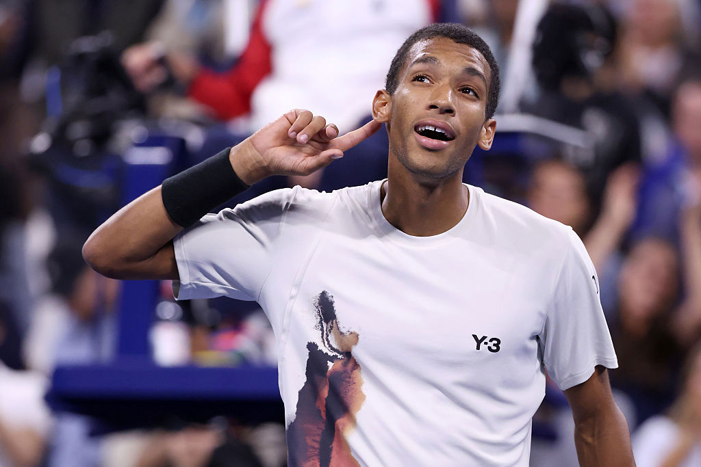 Felix Auger-Aliassime of Canada celebrates after defeating Alexander Zverev of Germany.