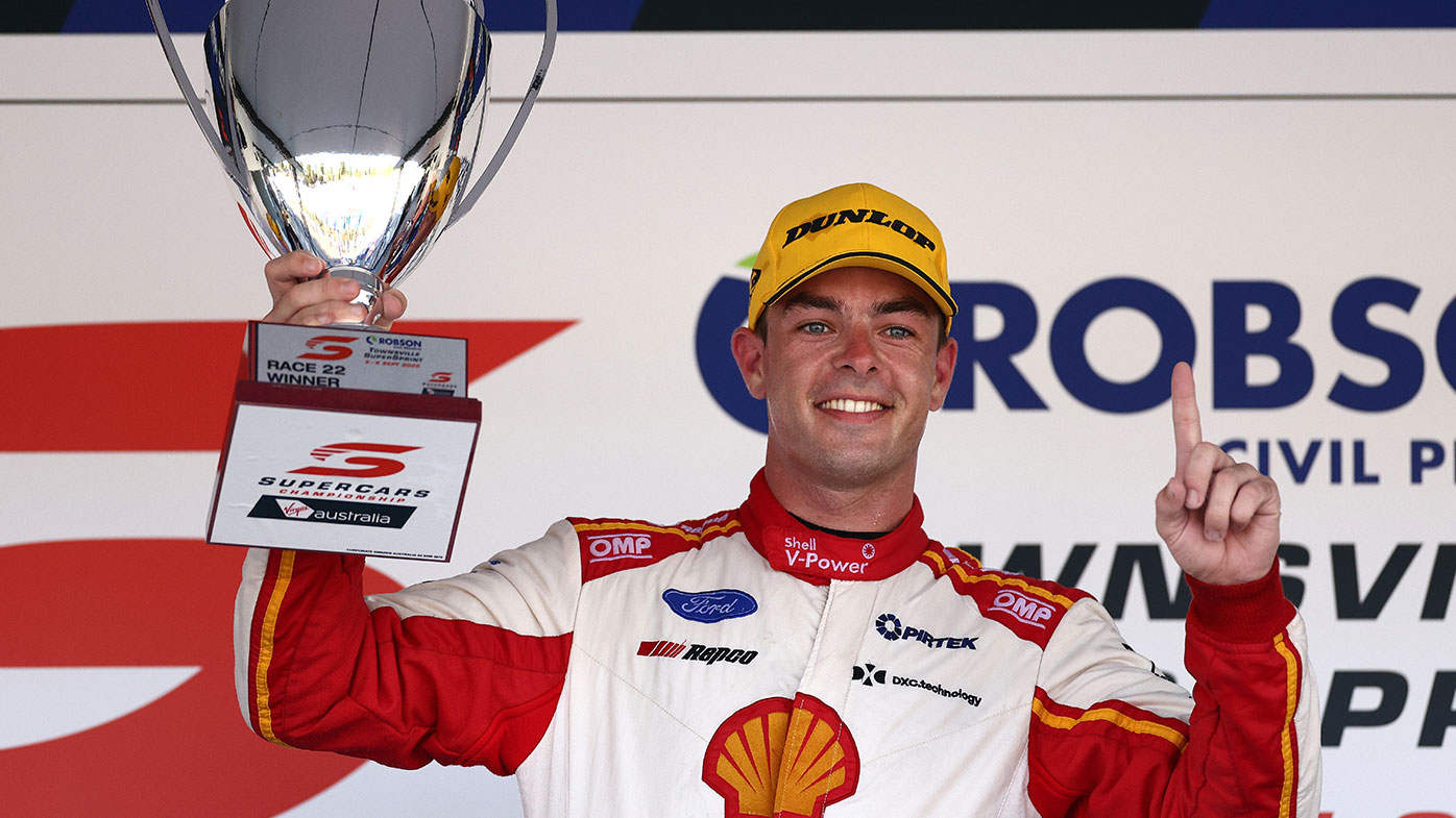 Scott McLaughlin driver of the #17 Shell V-Power Racing Team Ford Mustang celebrates his win after race 22 during the Townsville SuperSprint