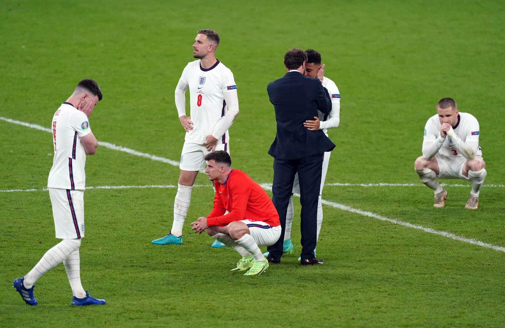 England manager Gareth Southgate consoles Jadon Sancho after his penalty miss following the UEFA Euro 2020 Final at Wembley Stadium, London. Picture date: Sunday July 11, 2021. (Photo by Mike Egerton/PA Images via Getty Images)