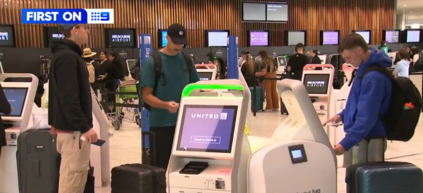 Essendon players at the airport.