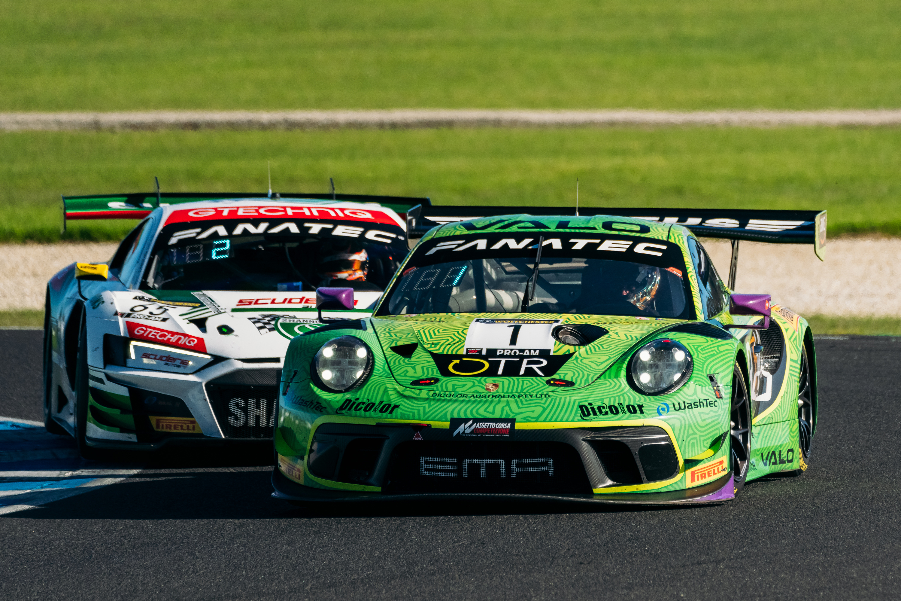 The Yasser Shahin/Garnet Patterson Porsche ahead of the Liam Talbot/Fraser Ross Audi.