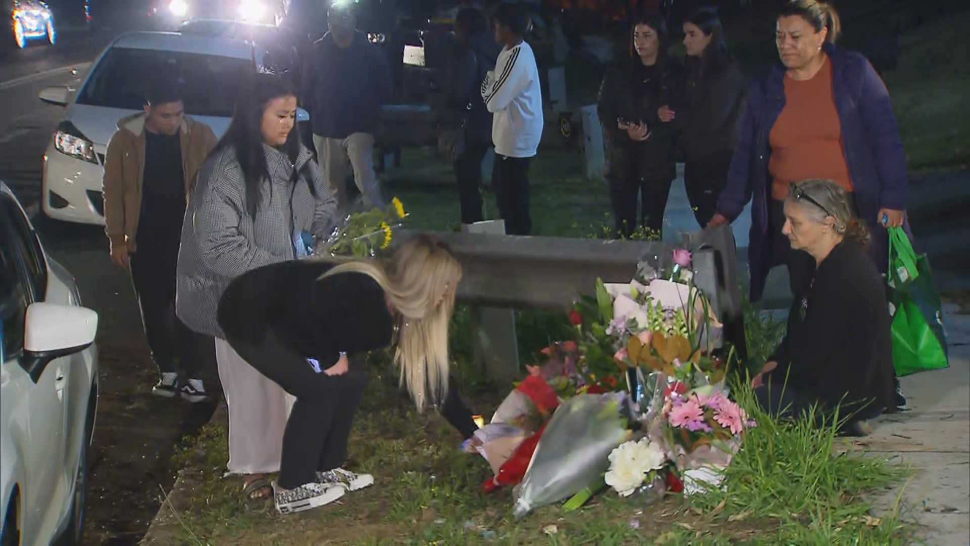 A vigil has been held for a brother and sister killed in a crash in Sydney.