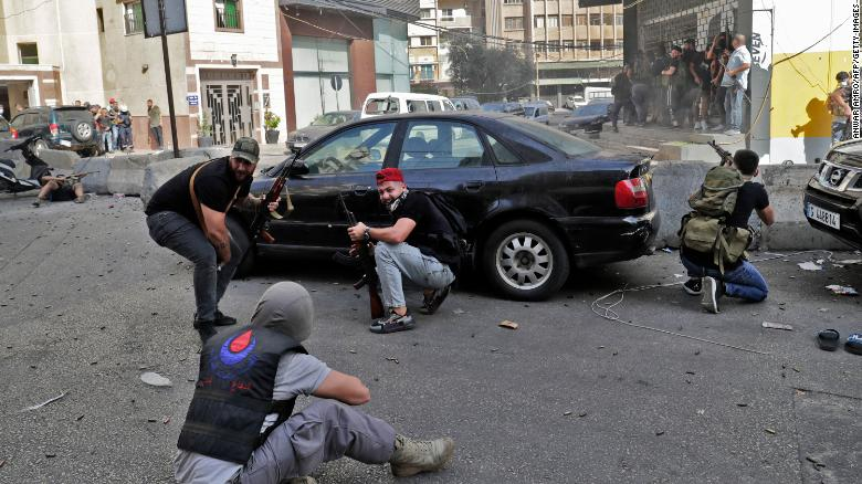 Fighters from the Hezbollah and Amal movements are seen during the clashes in Beirut.