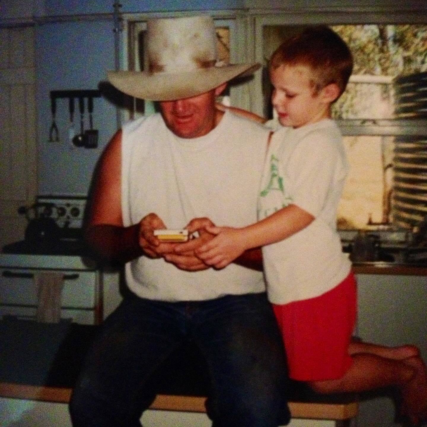 Luke Bateman with his dad. He grew up in western Queensland surrounded by 'hard working country man' culture.