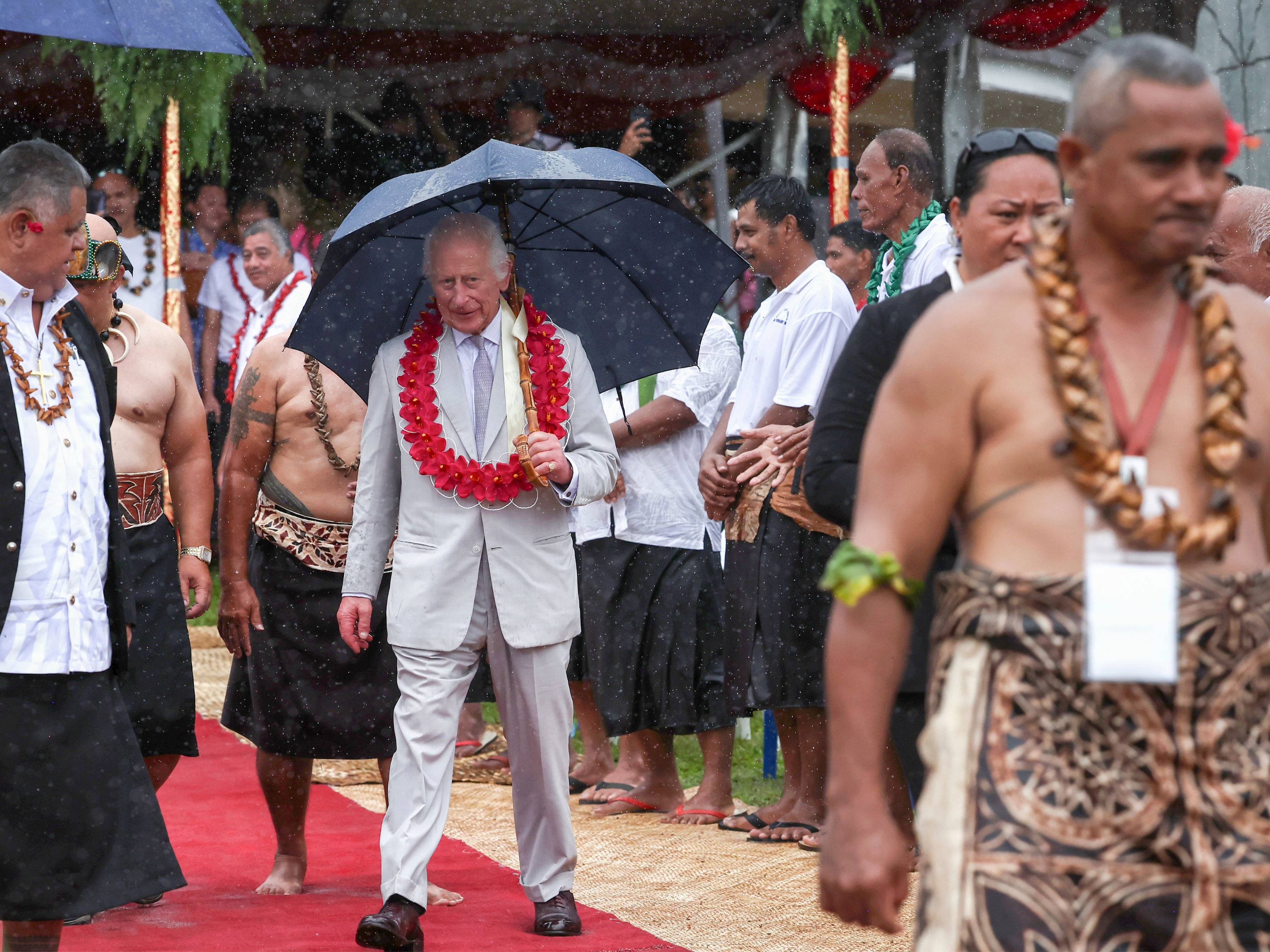 Britain's King Charles III departs after the bestowing and farewell ceremony on the final day of the royal visit to Samoa at the Siumu Village in Apia, Samoa, Saturday, Oct. 26, 2024. (Manaui Faulalo/Pool Photo via AP) 