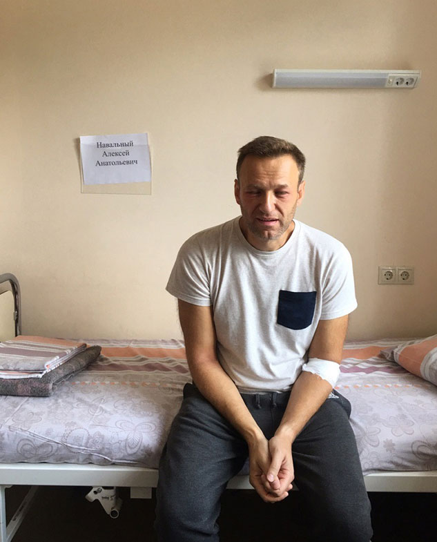This Monday, July 29, 2019 handout photo released by navalny.com shows Alexei Navalny, Russia's most prominent opposition figure, sitting on a bed in a hospital, in Moscow, Russia. Russian opposition leader Alexei Navalny was discharged from a hospital Monday even though his physician raised suspicions of a possible poisoning after he suffered facial swelling and a rash while in jail