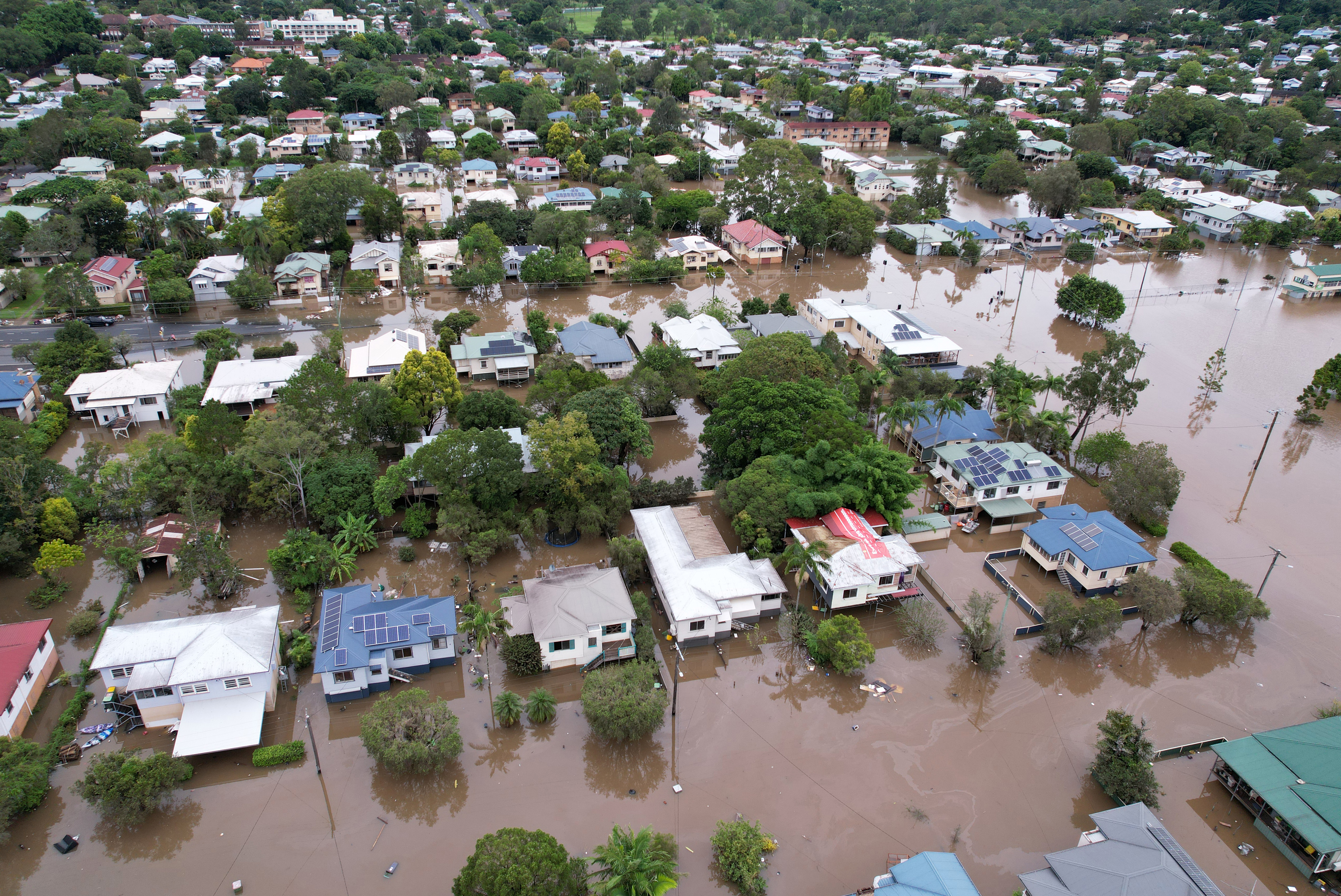  An aerial drone view of houses surrounded by floodwater on March 31, 2022 in Lismore, Australia. Evacuation orders have been issued for towns across the NSW Northern Rivers region, with flash flooding expected as heavy rainfall continues. It is the second major flood event for the region this month. (Photo by Dan Peled/Getty Images)