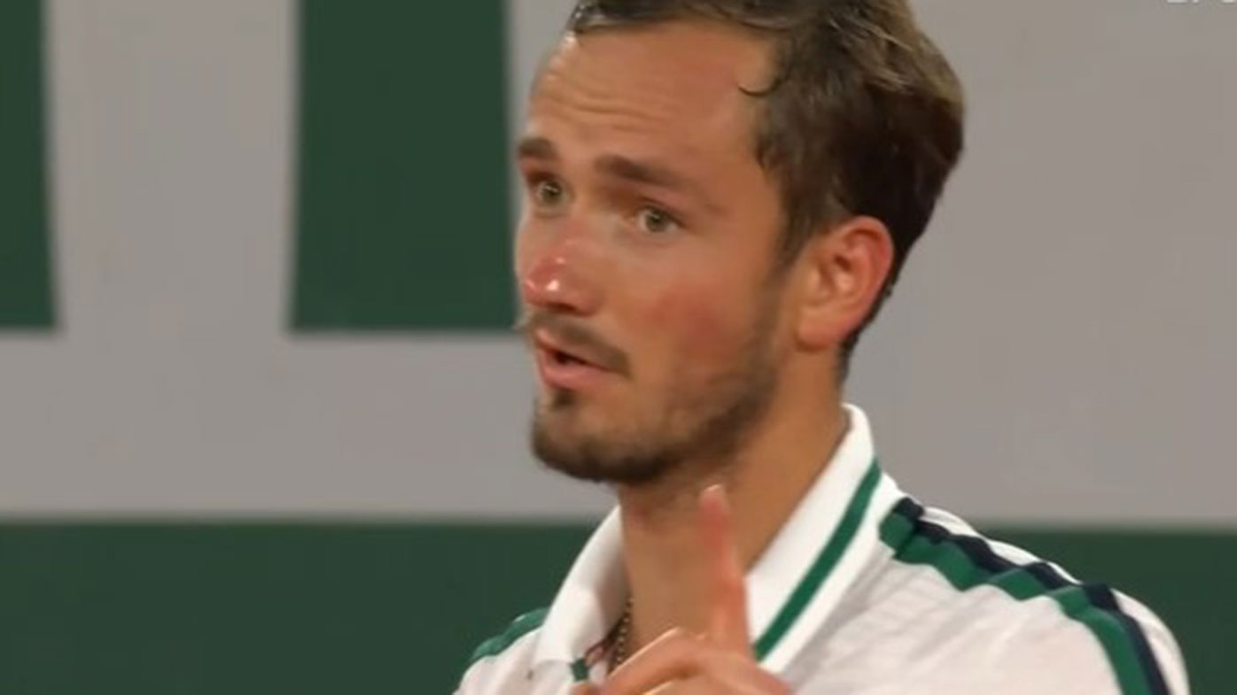 Daniil Medvedev argues with the umpire during his Roland-Garros loss to Stefanos Tsitsipas.