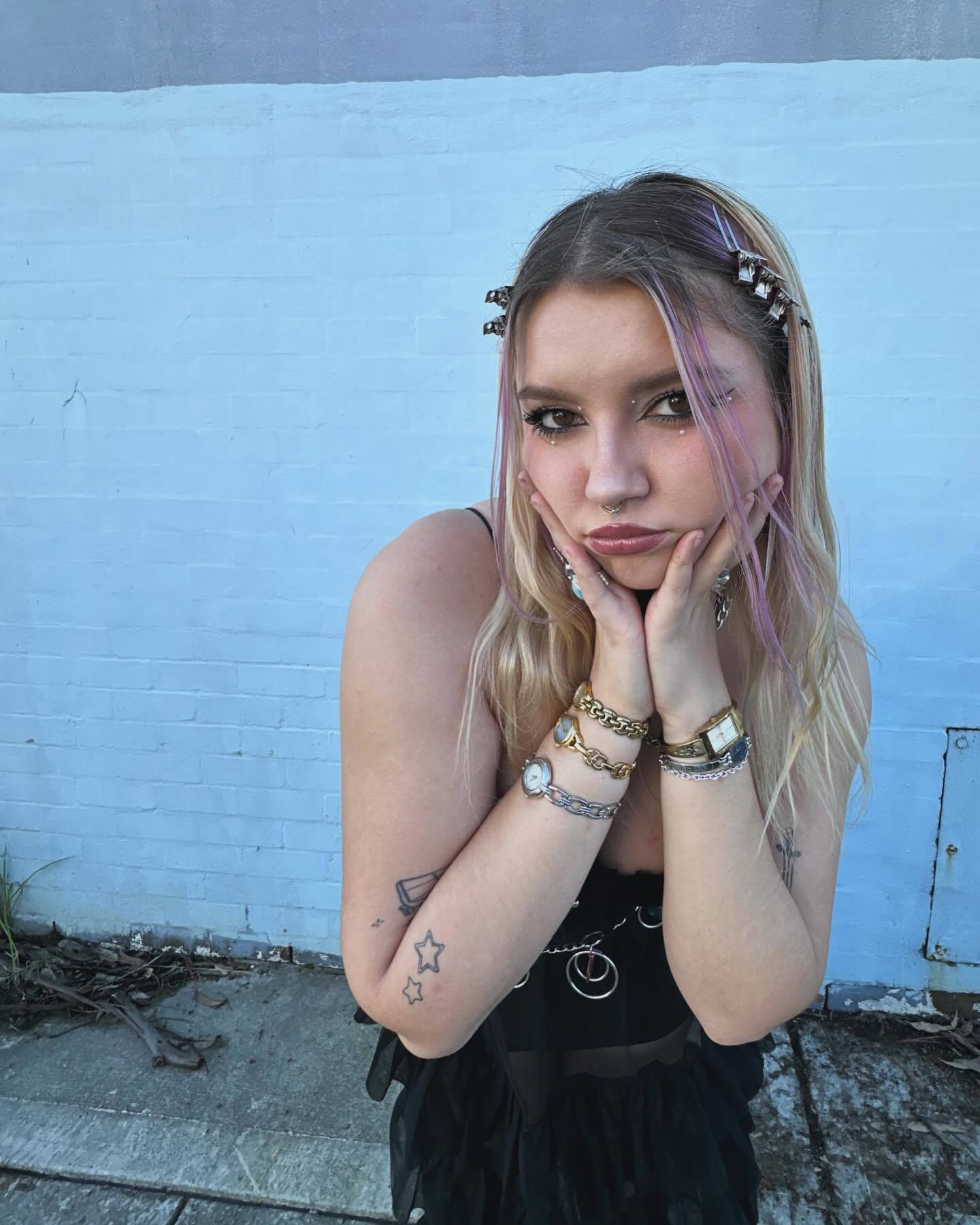 Ūla started busking in Sydney city as a teen and built a music career out of it.