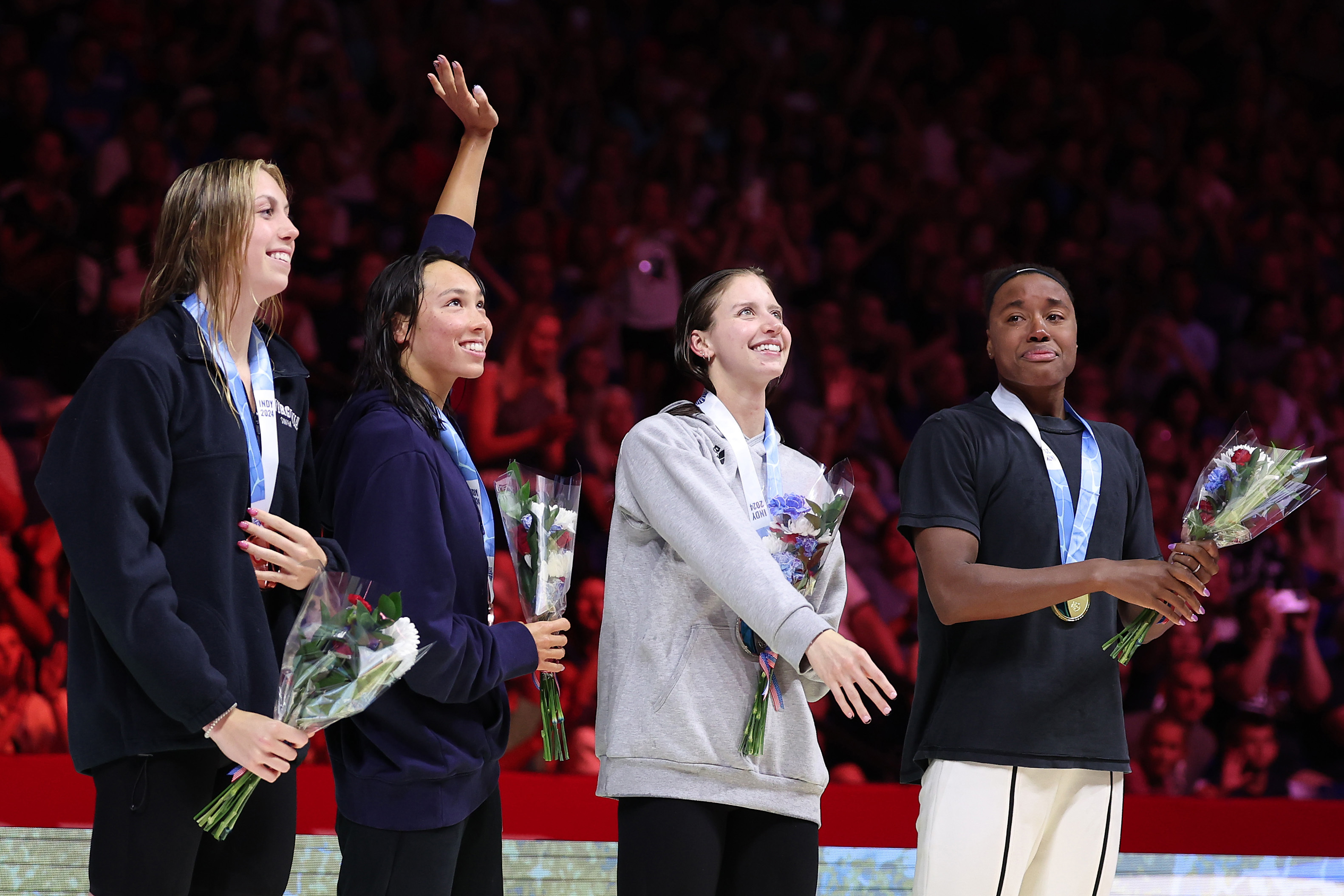 From left: Gretchen Walsh, Torri Huske, Kate Douglass and Simone Manuel after the women's 100m freestyle final at the USA trials.