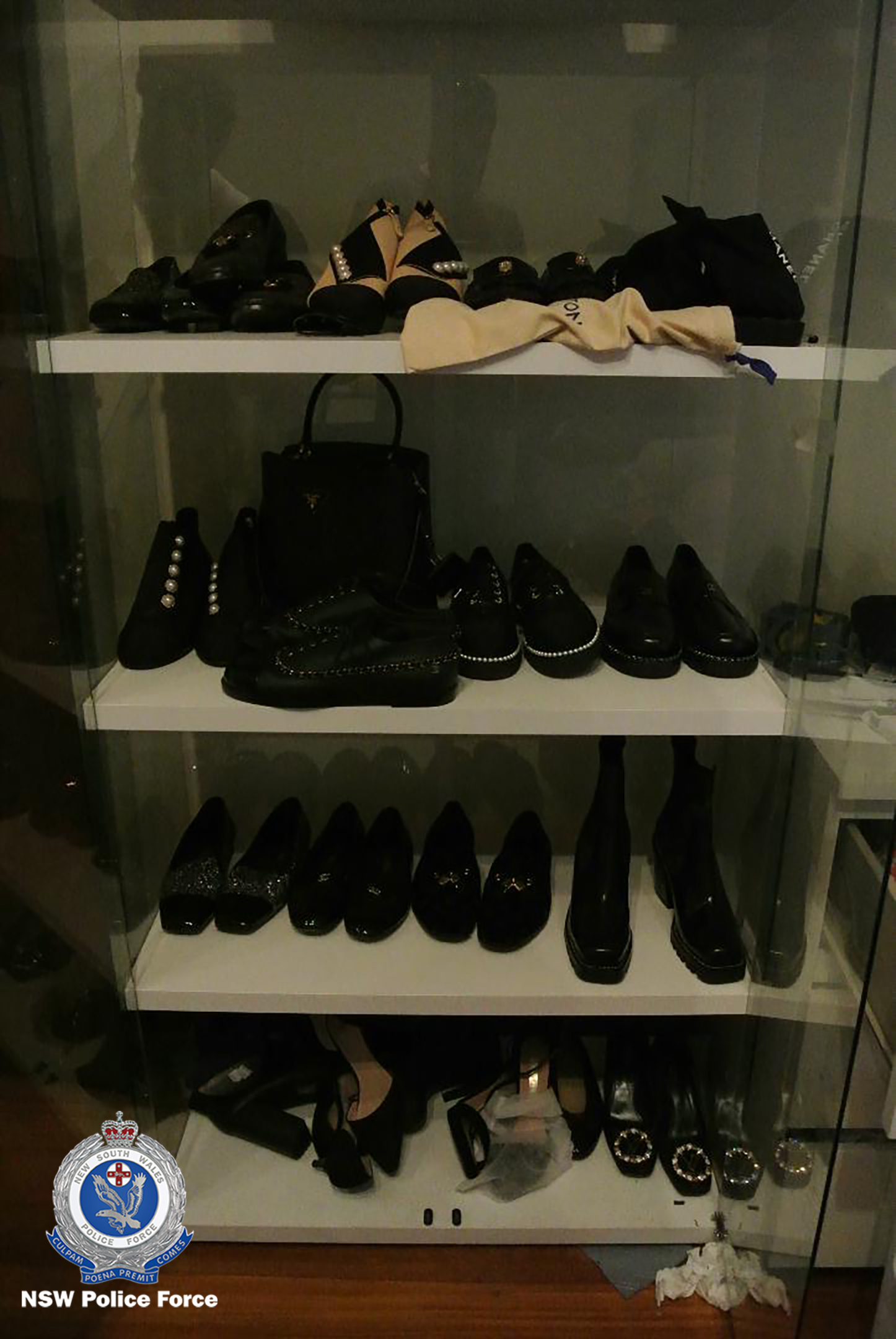 Officers seized 15 pairs of high-end women's shoes including brands such as Gucci and Louis Vuitton.