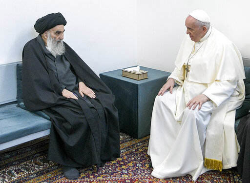 Pope Francis, right, meets with Iraq's leading Shiite cleric, Grand Ayatollah Ali al-Sistani in Najaf, Iraq, in March 2021.