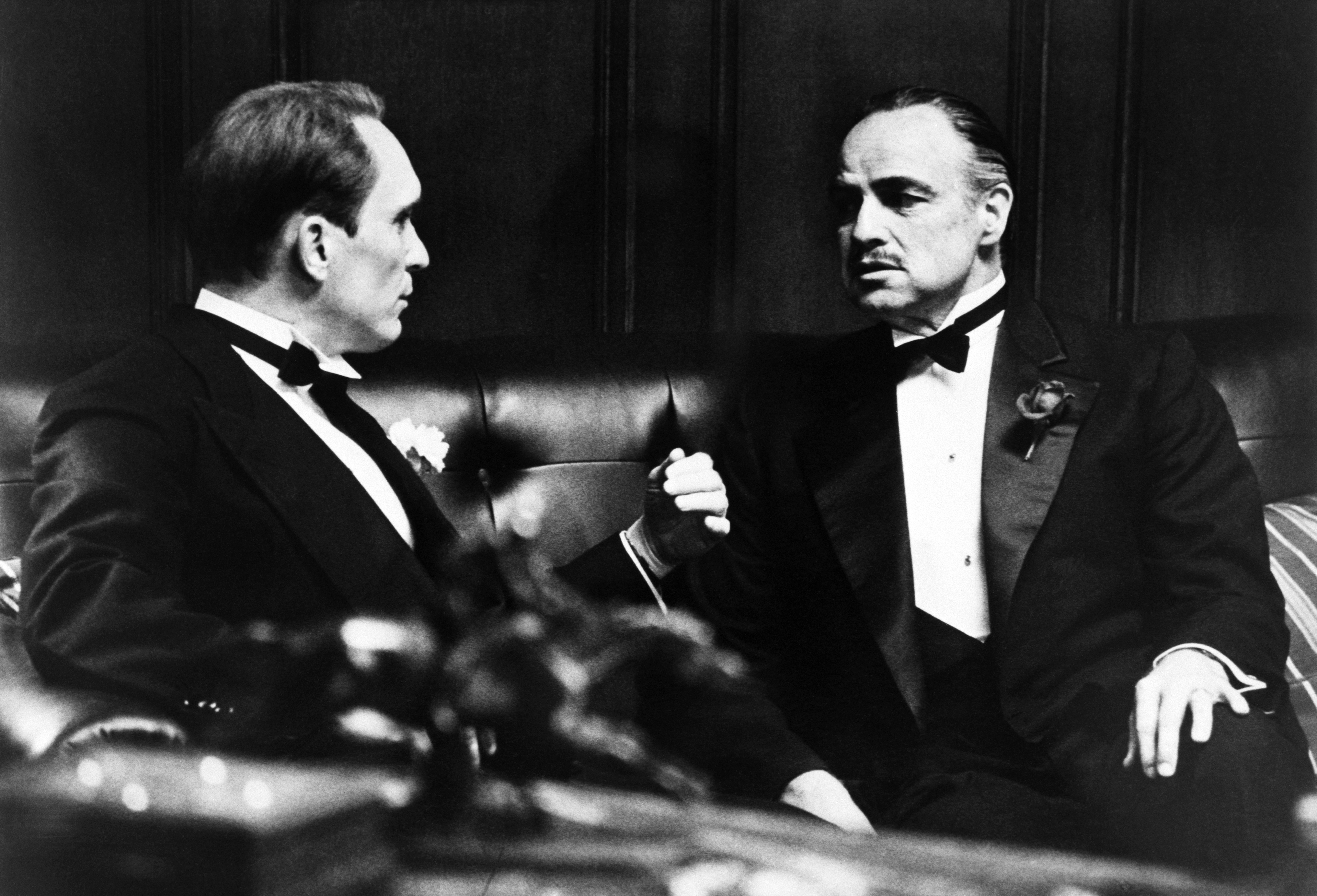 Robert Duvall, left, with Marlon Brando in a scene from The Godfather.