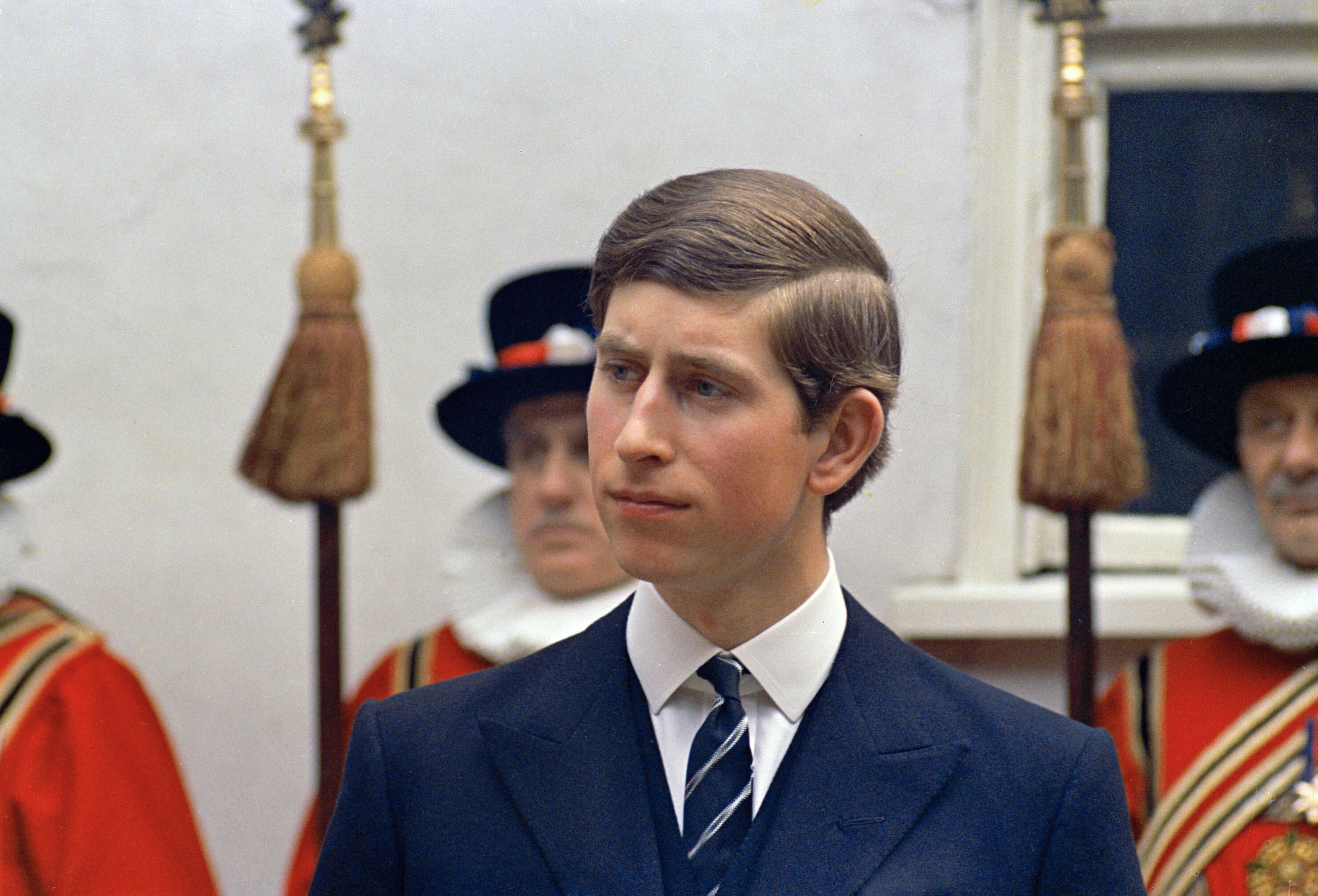 FILE - In this March 25, 1968 file photo, Prince Charles looks on, durig a procession, in London. Prince Charles has been preparing for the crown his entire life. Now, that moment has finally arrived. Charles, the oldest person to ever assume the British throne, became king on Thursday Sept. 8, 2022, following the death of his mother, Queen Elizabeth II. (AP Photo/Peter Kemp, File)