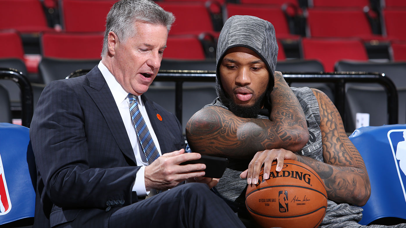 Neil Olshey talks with Portland superstar Damian Lillard 