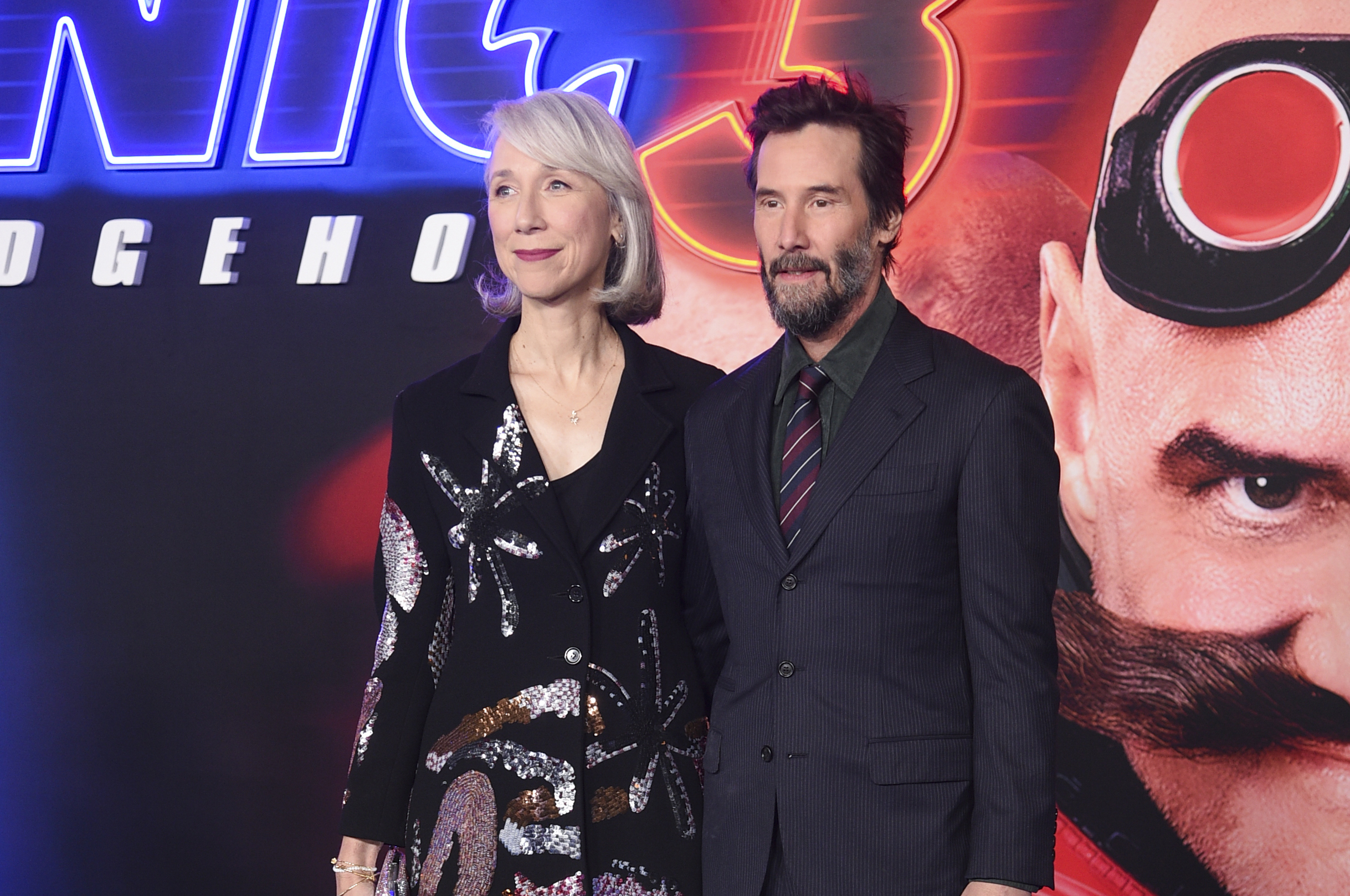 Alexandra Grant, left, and Keanu Reeves