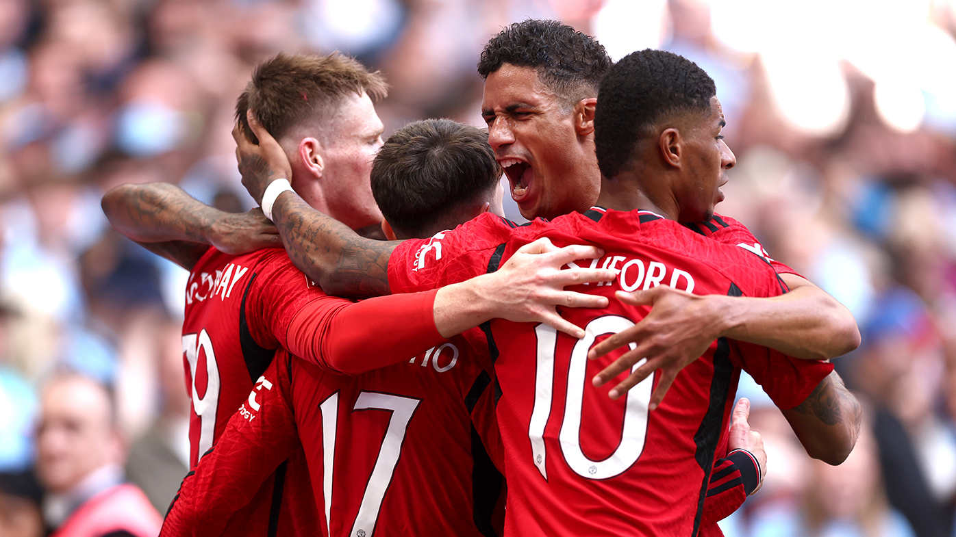 Raphael Varane of Manchester United celebrates after his team mate Alejandro Garnacho celebrates scoring his sides first goal during the Emirates FA Cup Final match between Manchester City and Manchester United at Wembley Stadium on May 25, 2024 in London, England. (Photo by Alex Pantling/Getty Images)