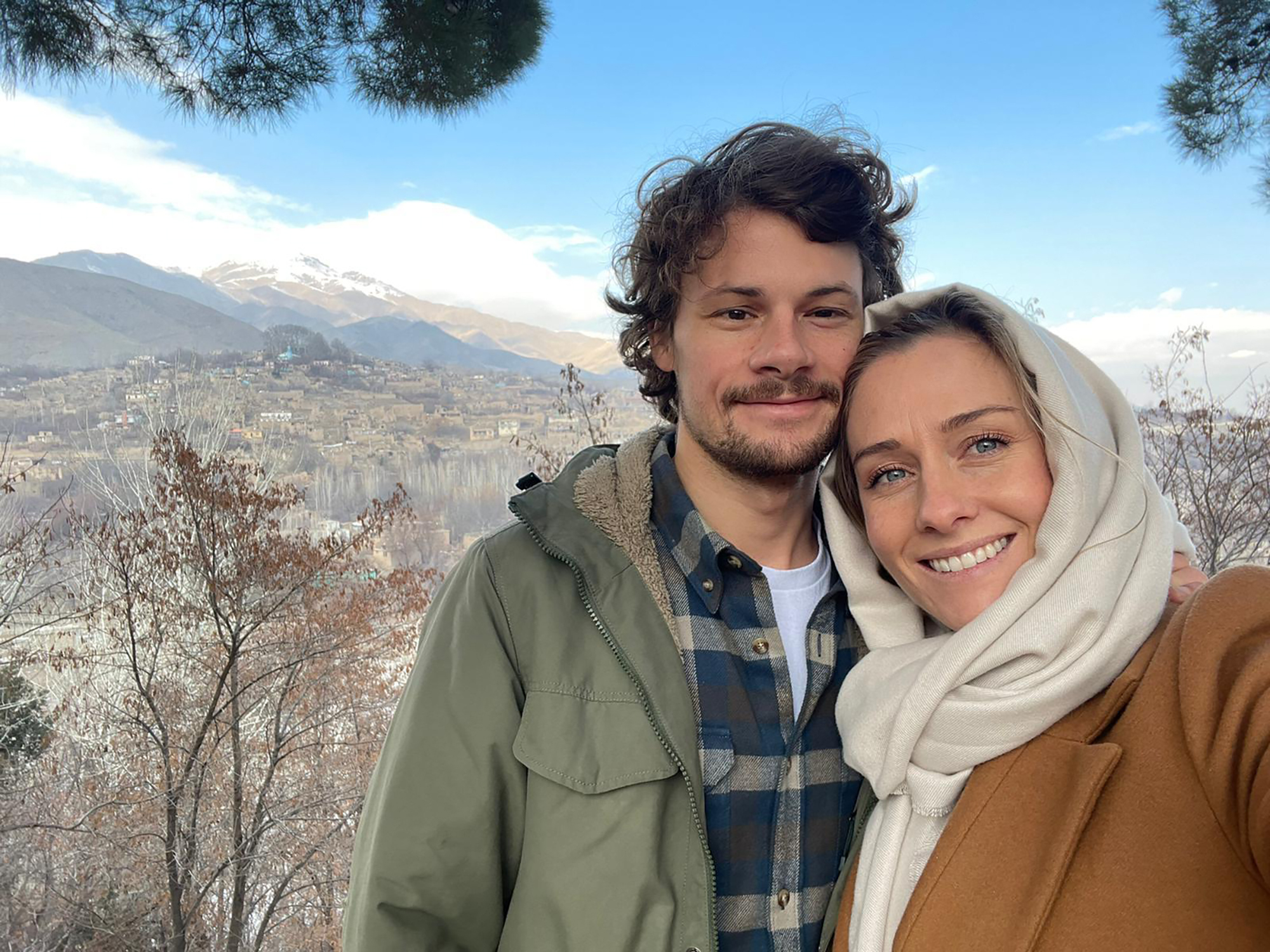 Charlotte Bellis poses in a selfie with her partner Jim Huylebroek in Kabul, Afghanistan