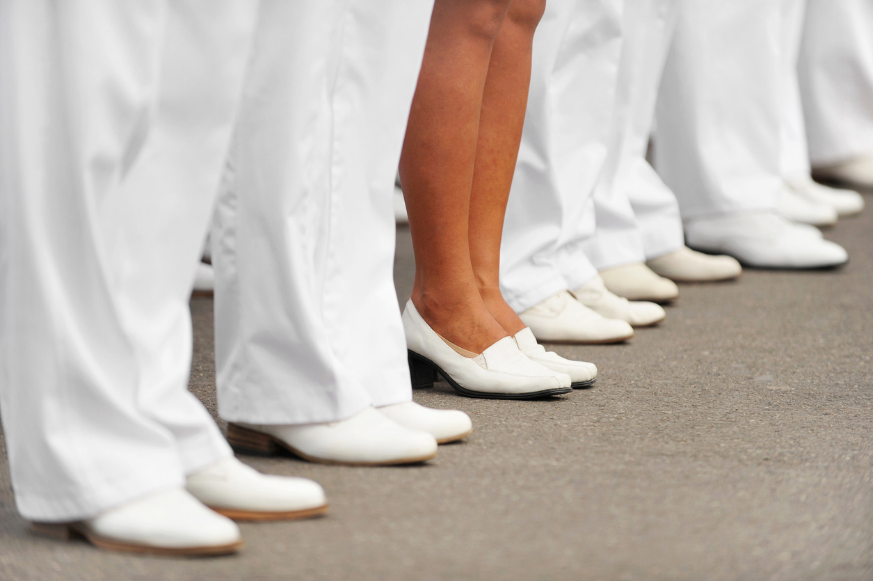 Navy officers stand in formation for Navy's Day Parade.