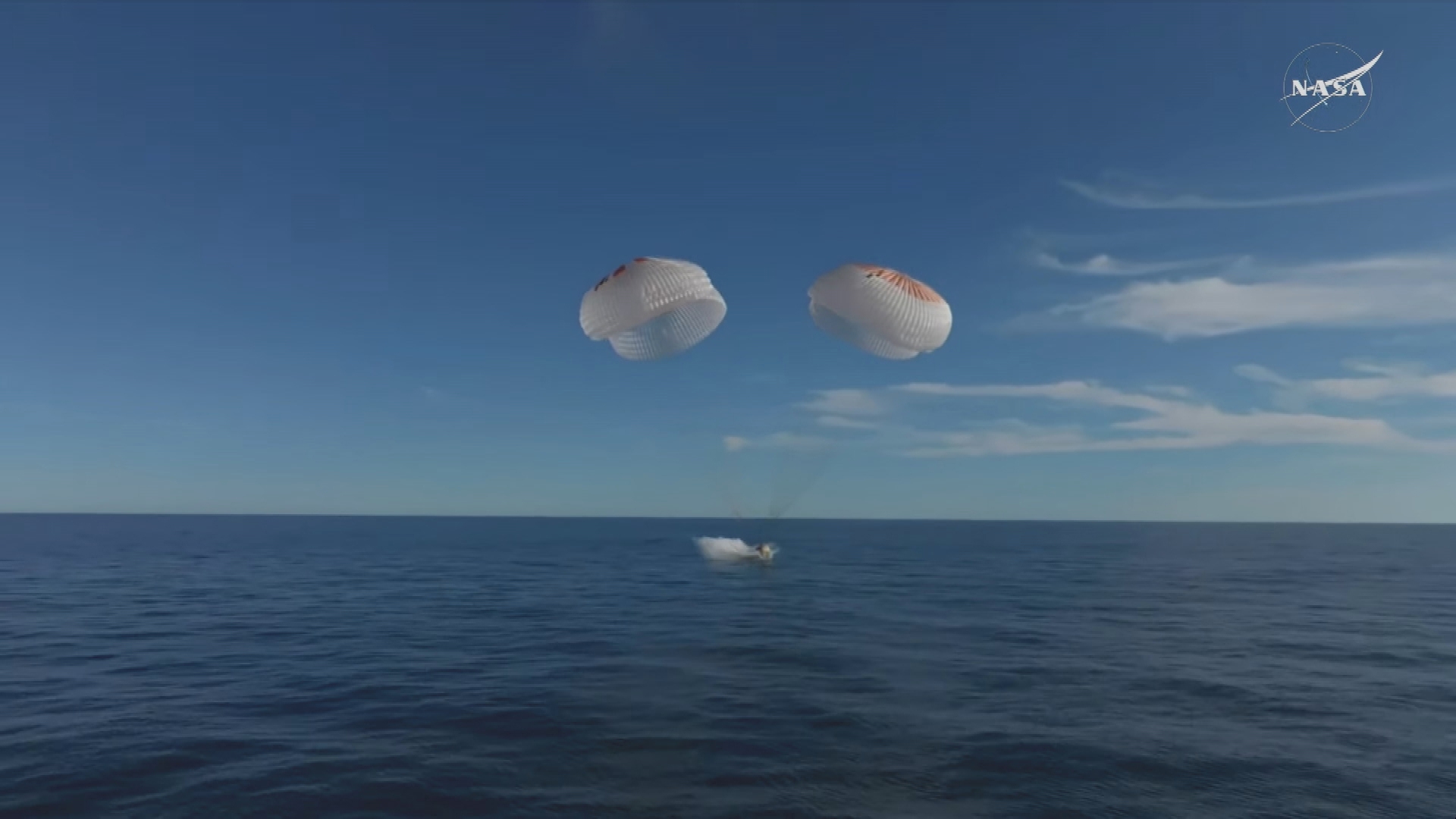 Stranded astronauts splashdown safely