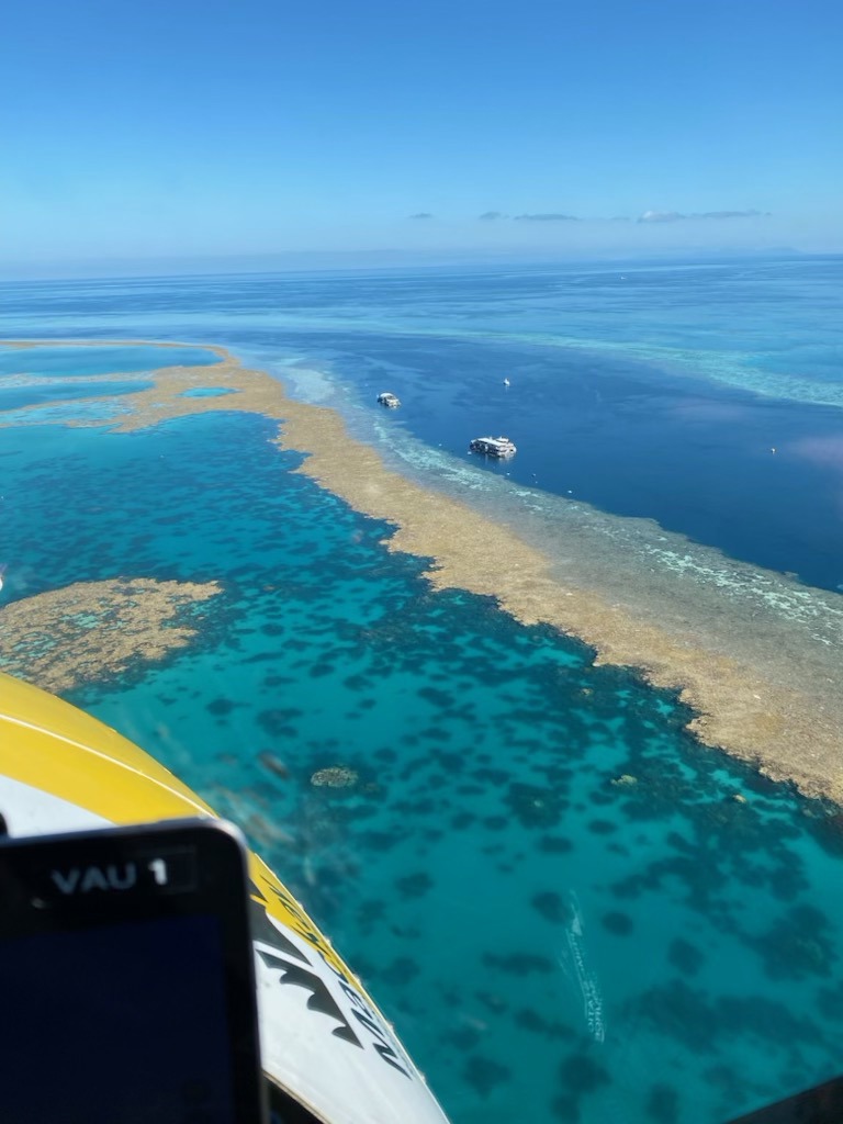 A woman has been winched off a yacht near Hook Reef about 150km north of Mackay.