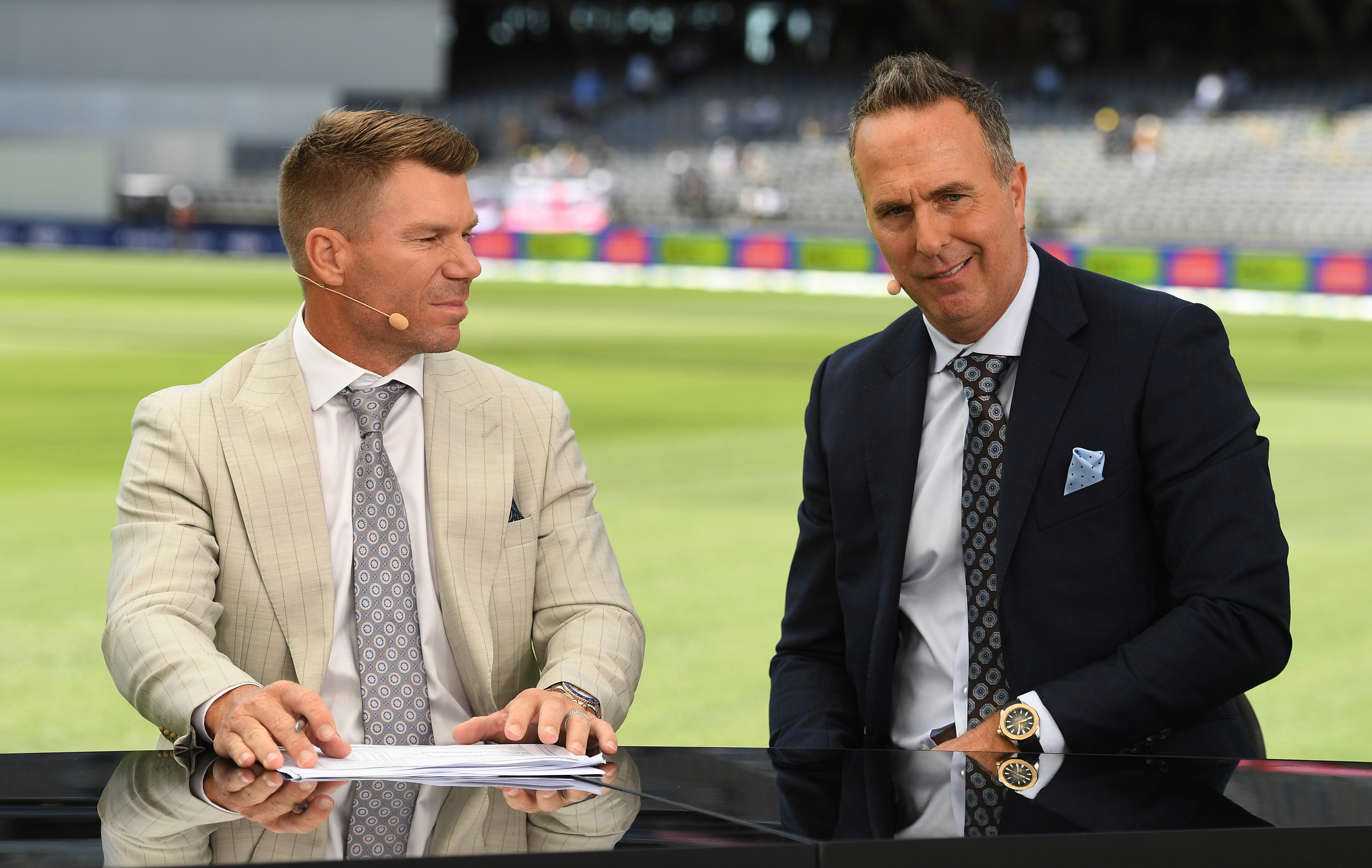 David Warner (L) and Michael Vaughan.