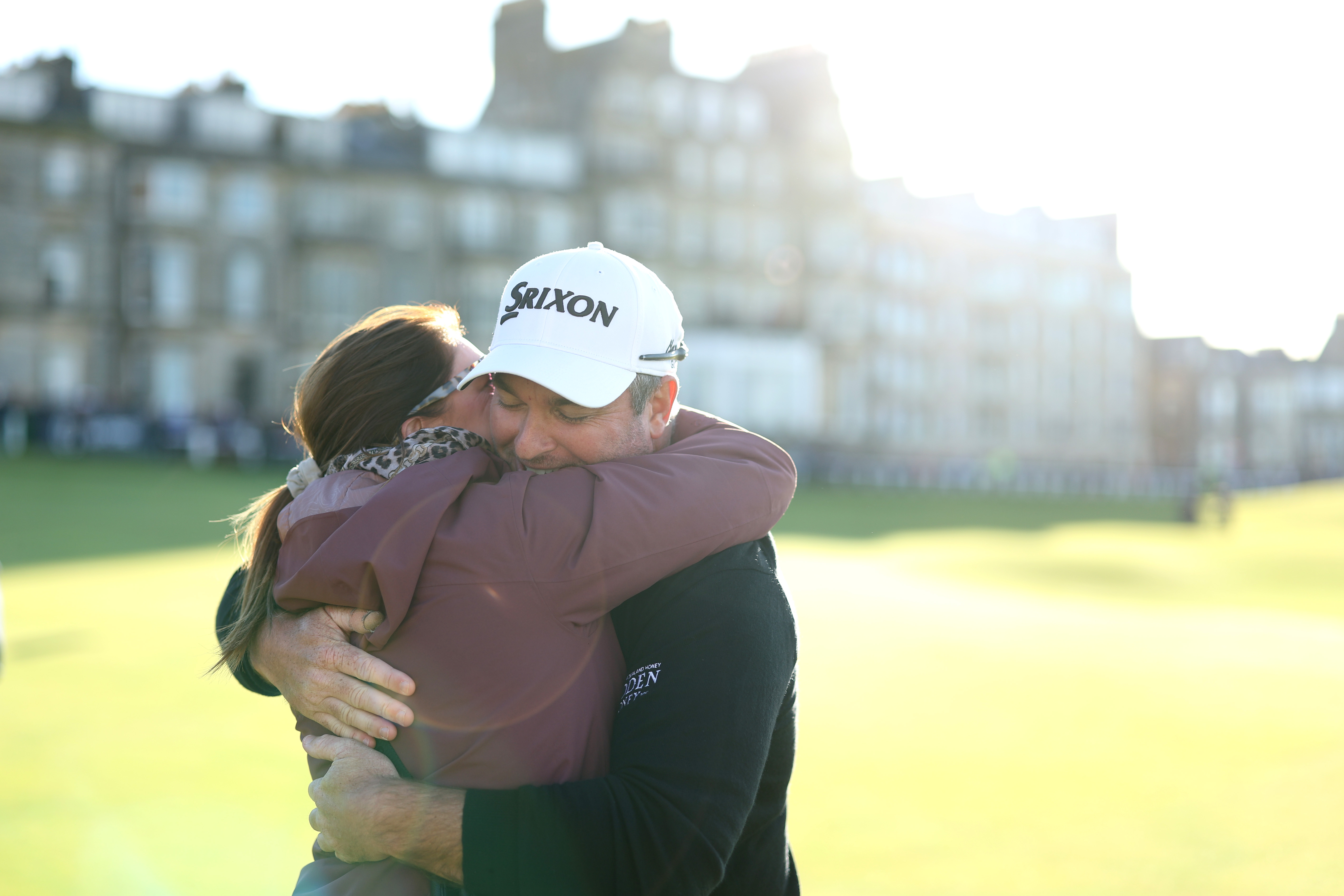 Ryan Fox of New Zealand embraces his wife, Anneke, after winning the Alfred Dunhill Links Championship on the Old Course St. Andrews.
