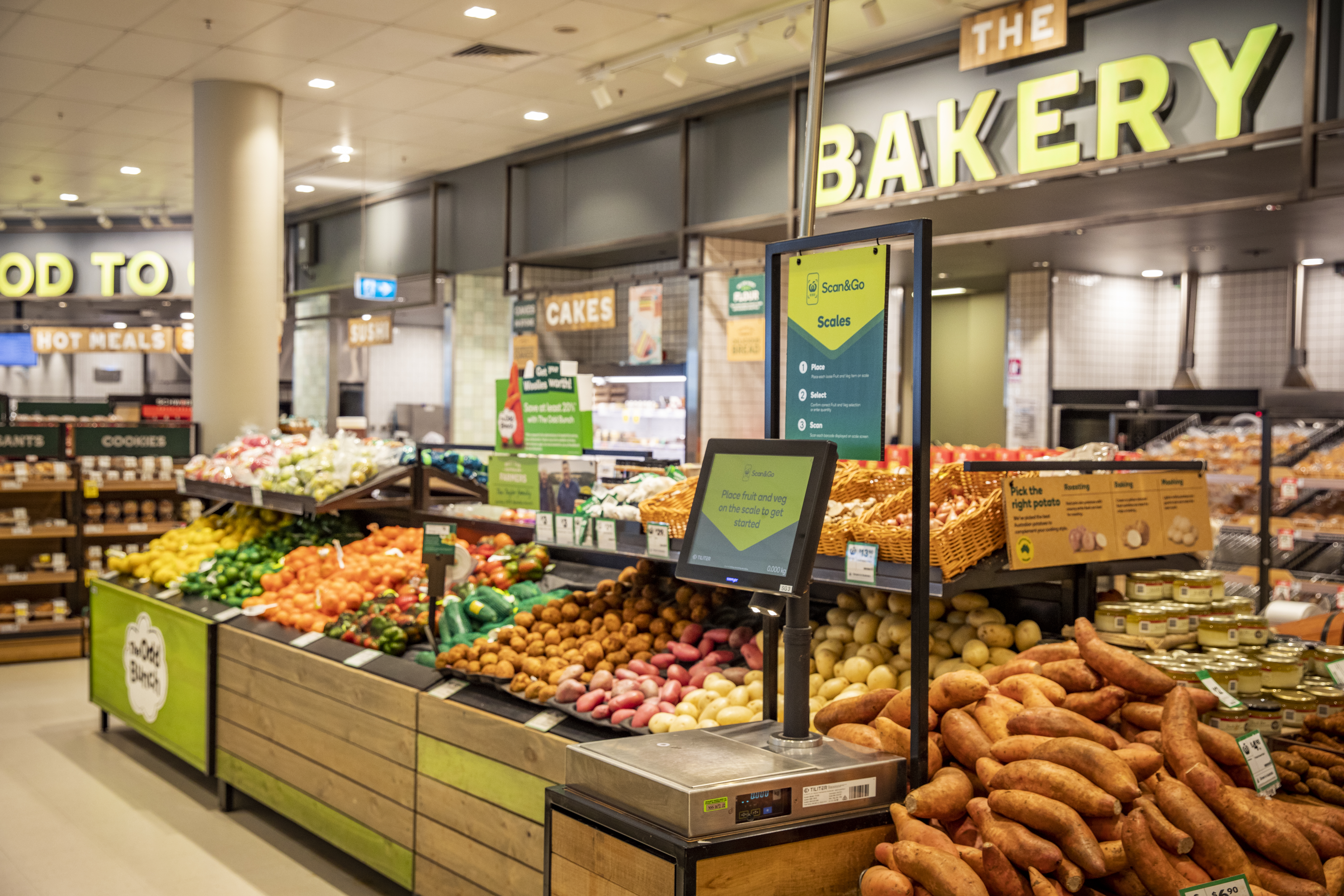 New Woolworths scales show weight and price of loose fruit and vegetables.