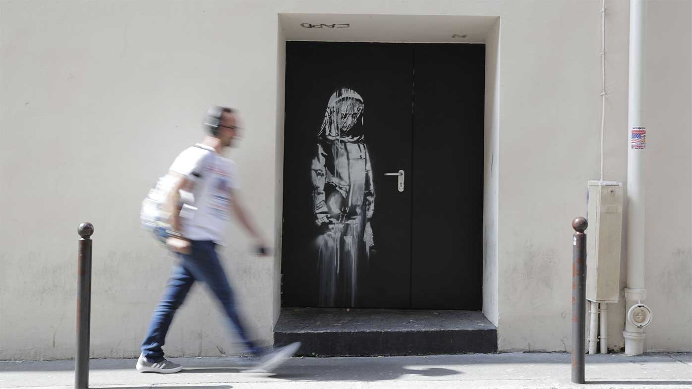 The Banksy artwork on the door at the Bataclan in Paris.