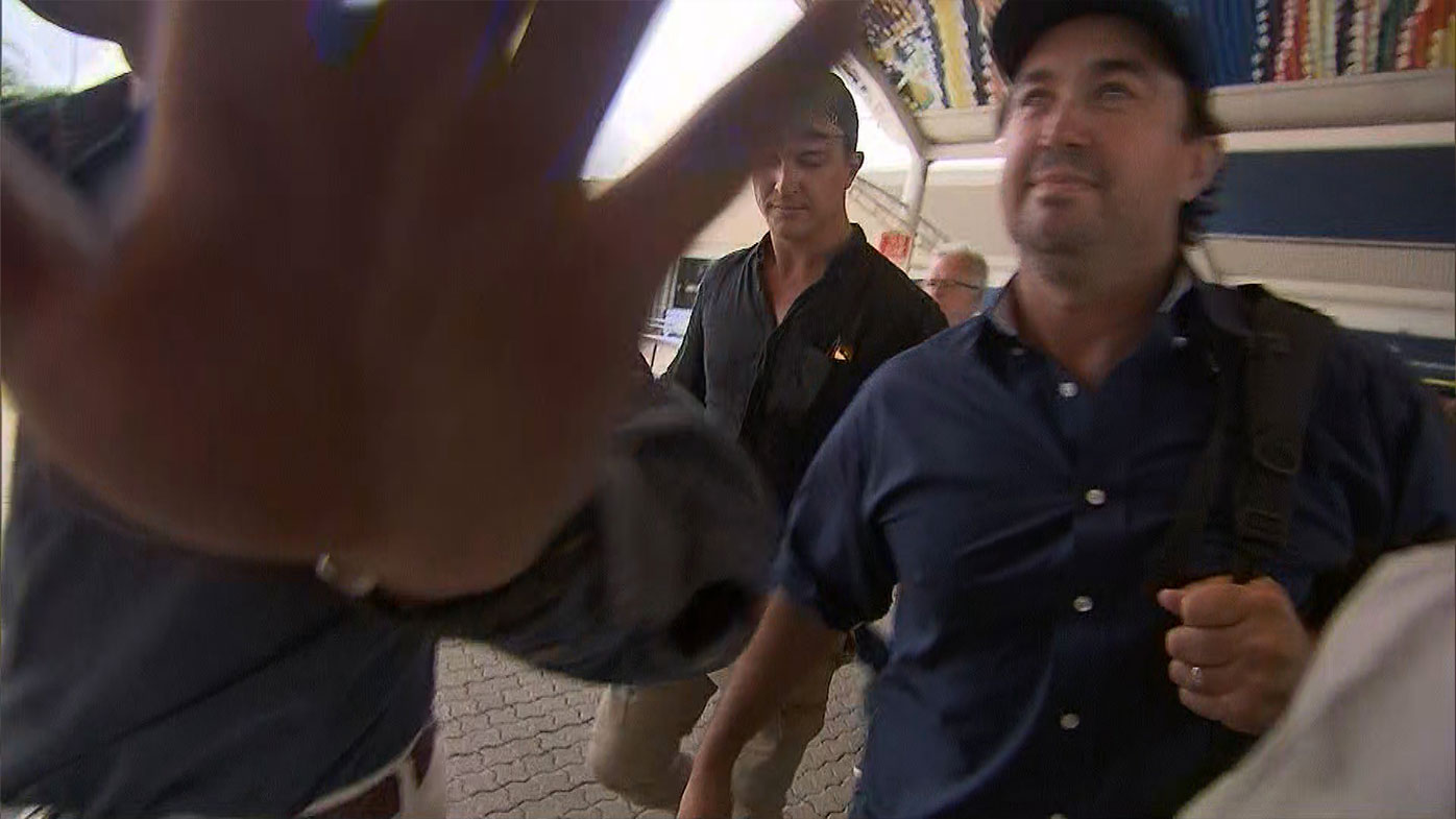 Outback Wrangler star Matt Wright, Darwin Airport, friends jostle with media