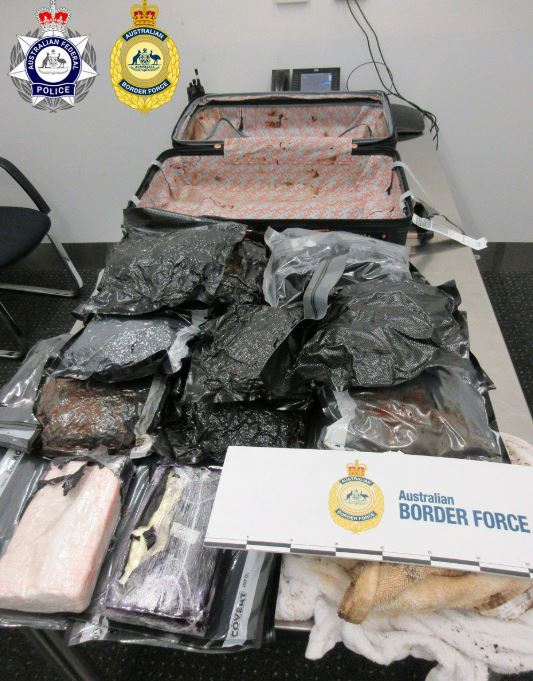 Two travellers have been charged over allegedly importing drugs into Australia hidden in luggage at Melbourne Airport.