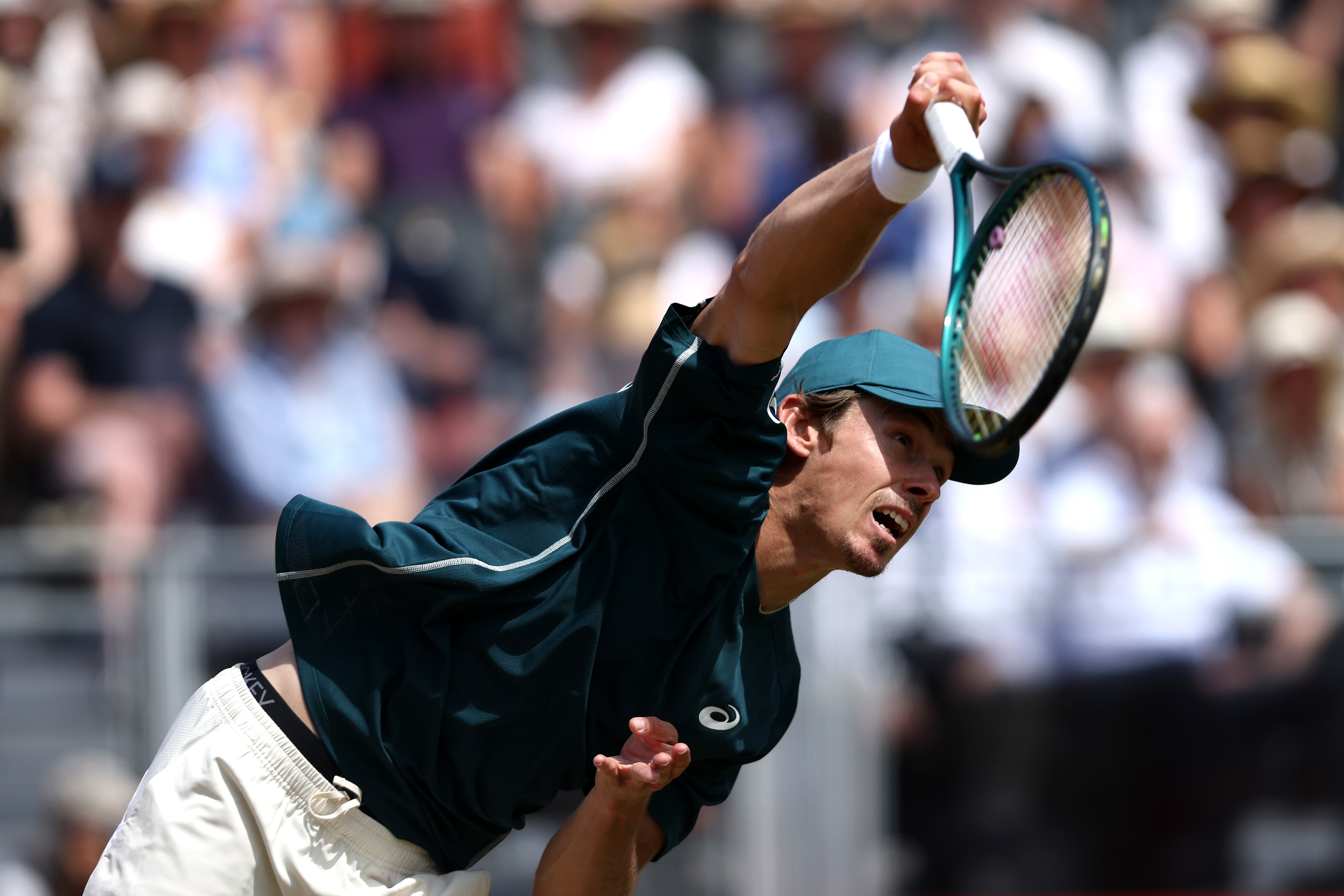 Alex de Minaur of Australia serves against Jiri Lehecka of Czechia during the Men's Singles First Round match on Day Nine of the 2025 HSBC Championships at The Queen's Club on June 17, 2025 in London, England.  (Photo by Dan Istitene/Getty Images)