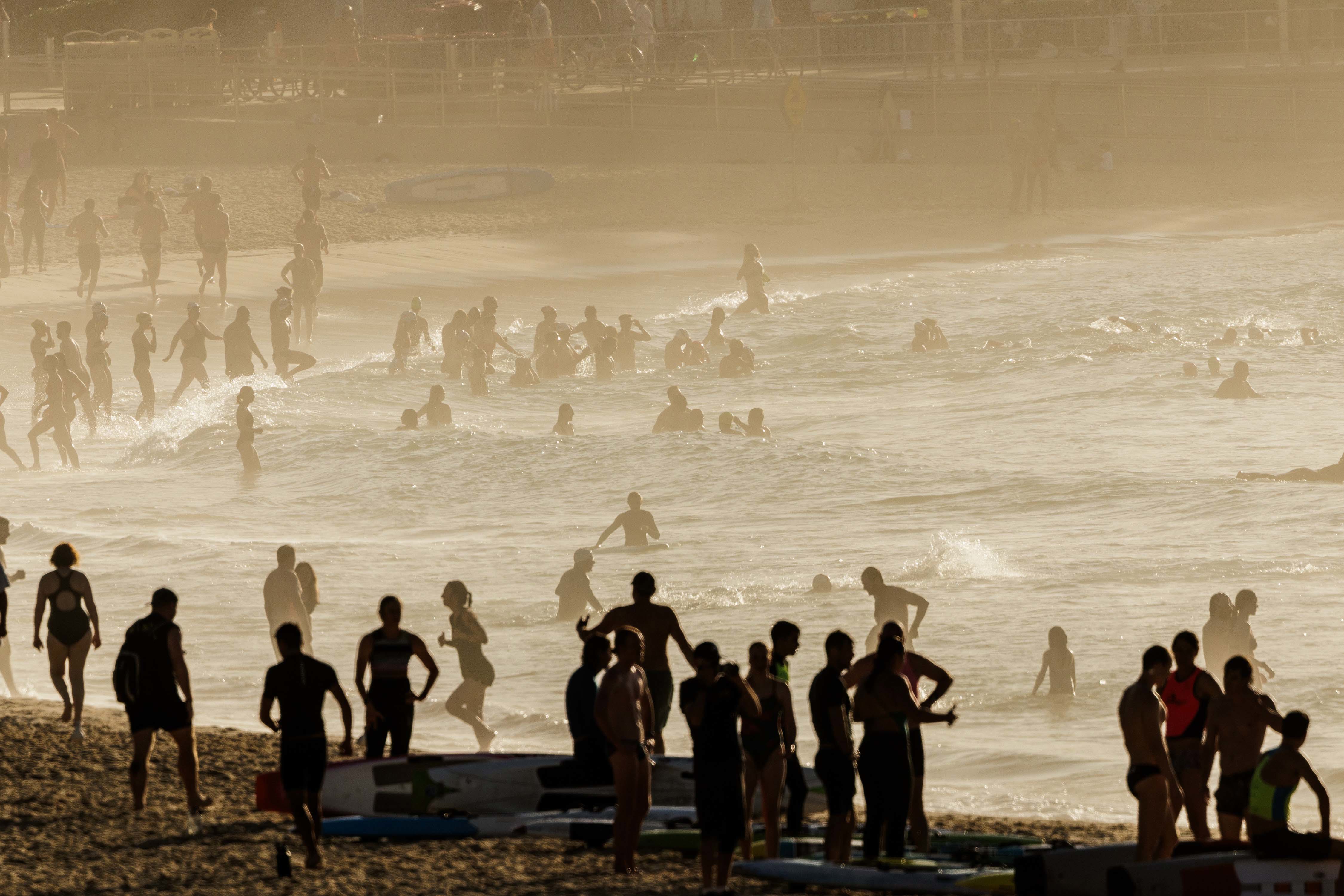 A packed Bondi Beach at sunrise on November 27, 2024 in Sydney, Australia.