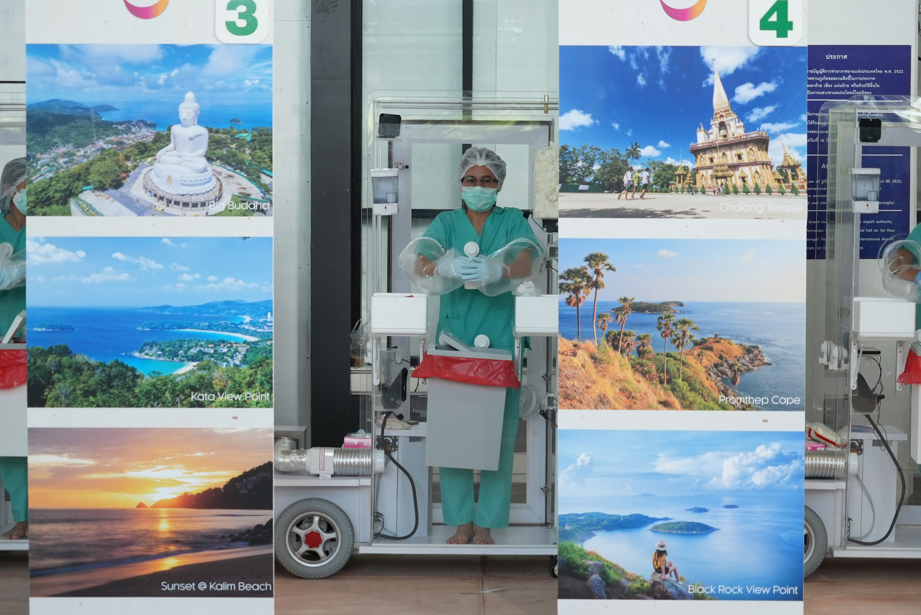 Phuket International Airport staff await incoming travellers on July 1.