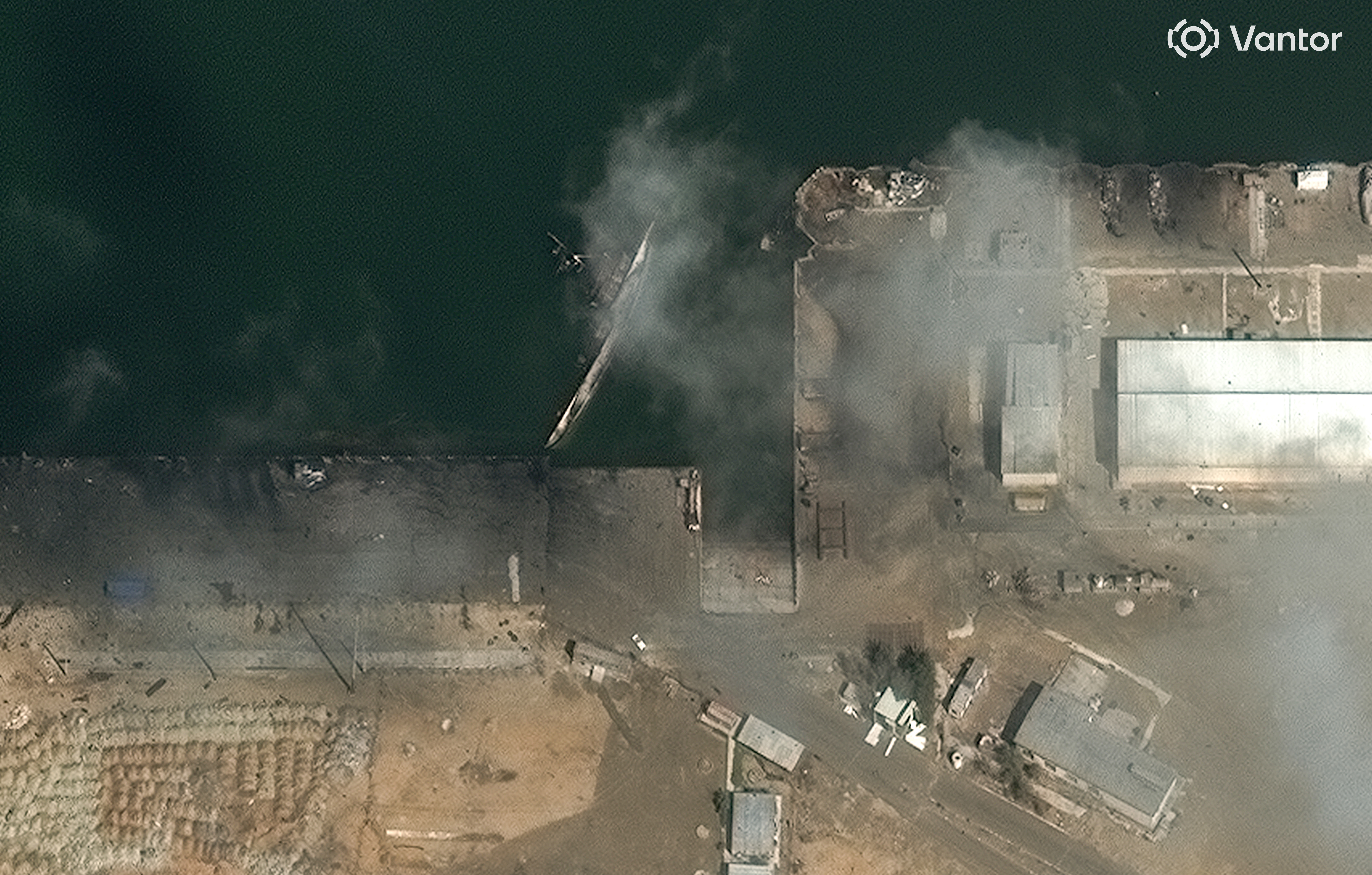This satellite image provided by Vantor shows a view of capsized ship at Konarak Naval base in Iran on Wednesday, March 4, 2026.    