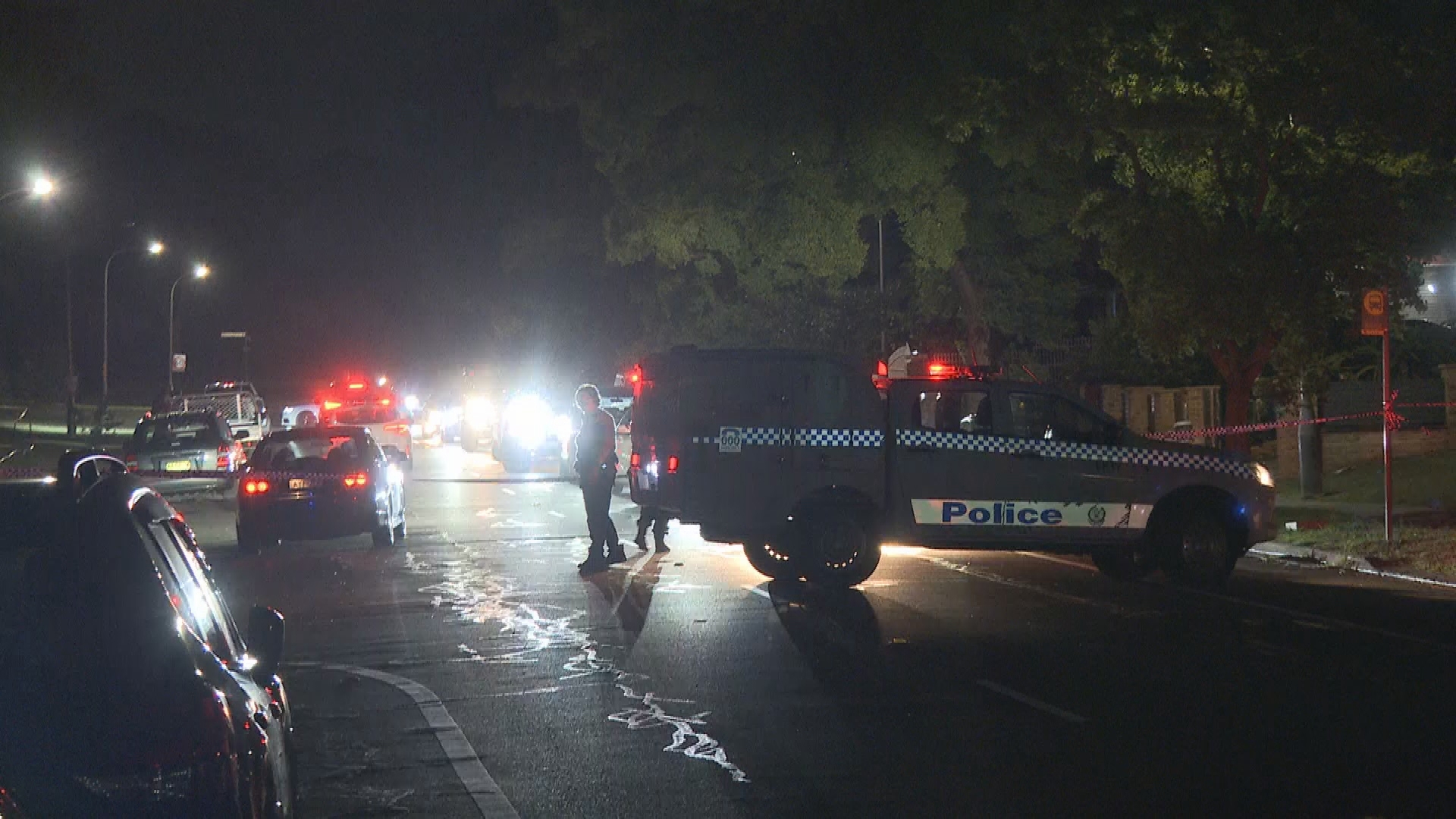 Police at a home in Bonnyrigg, in Sydney's west, after the Bondi Beach shooting.