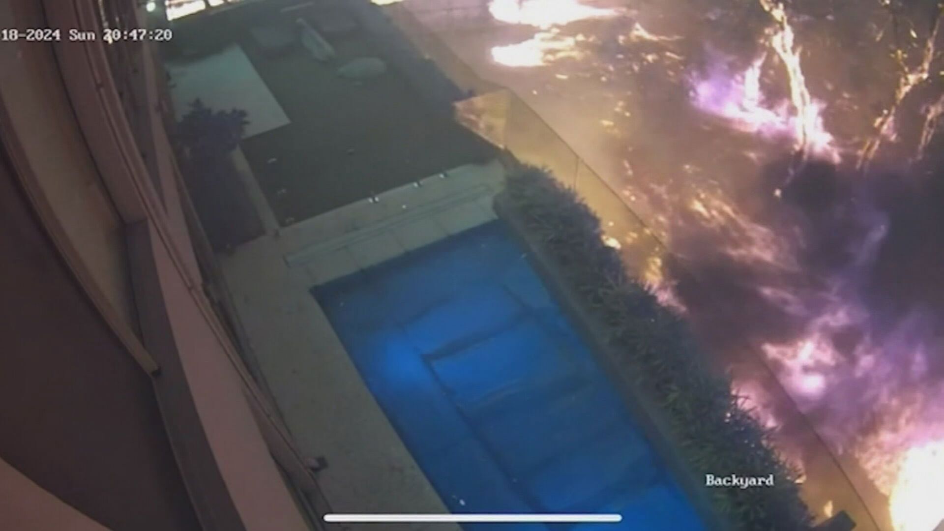 Footage from one resident's security camera shows how close the fire came to their Perth home.