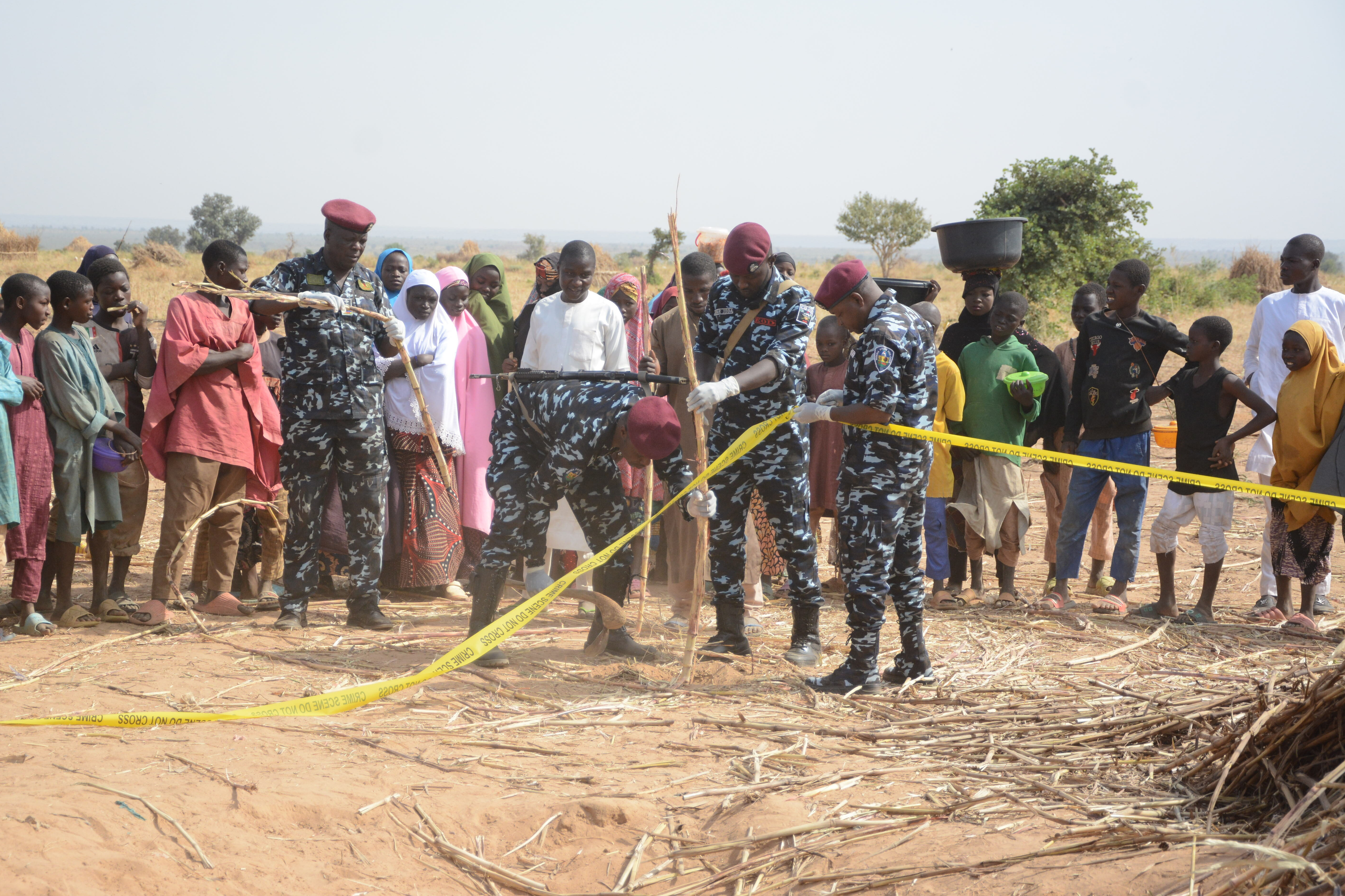 Nigeria police, Anti-Bomb squad, secure the scene of a U.S. airstrike in Northwest, Jabo, Nigeria, Friday, Dec. 26, 2025. (AP Photo/ Tunde Omolehin)