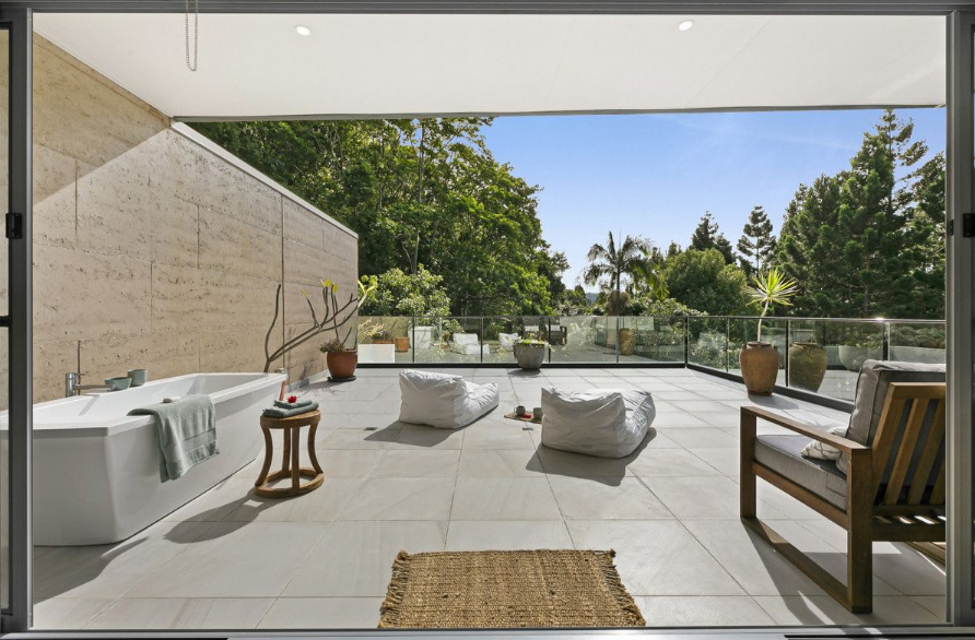 Homes on the market with bath tubs on the balconies.