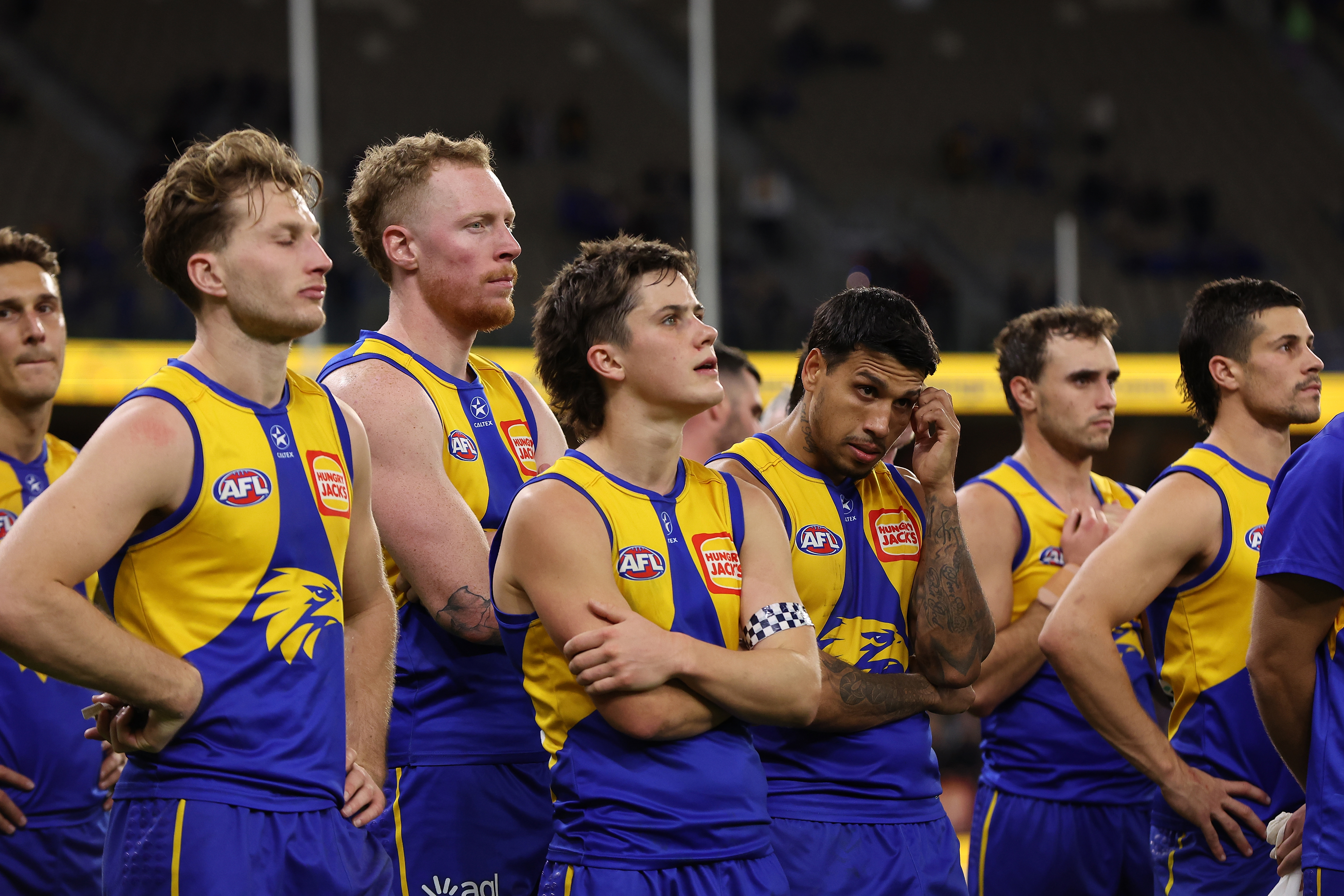 PERTH, AUSTRALIA - AUGUST 12: The Eagles look on after being defeated during the round 22 AFL match between West Coast Eagles and Fremantle Dockers at Optus Stadium, on August 12, 2023, in Perth, Australia. (Photo by Paul Kane/Getty Images)