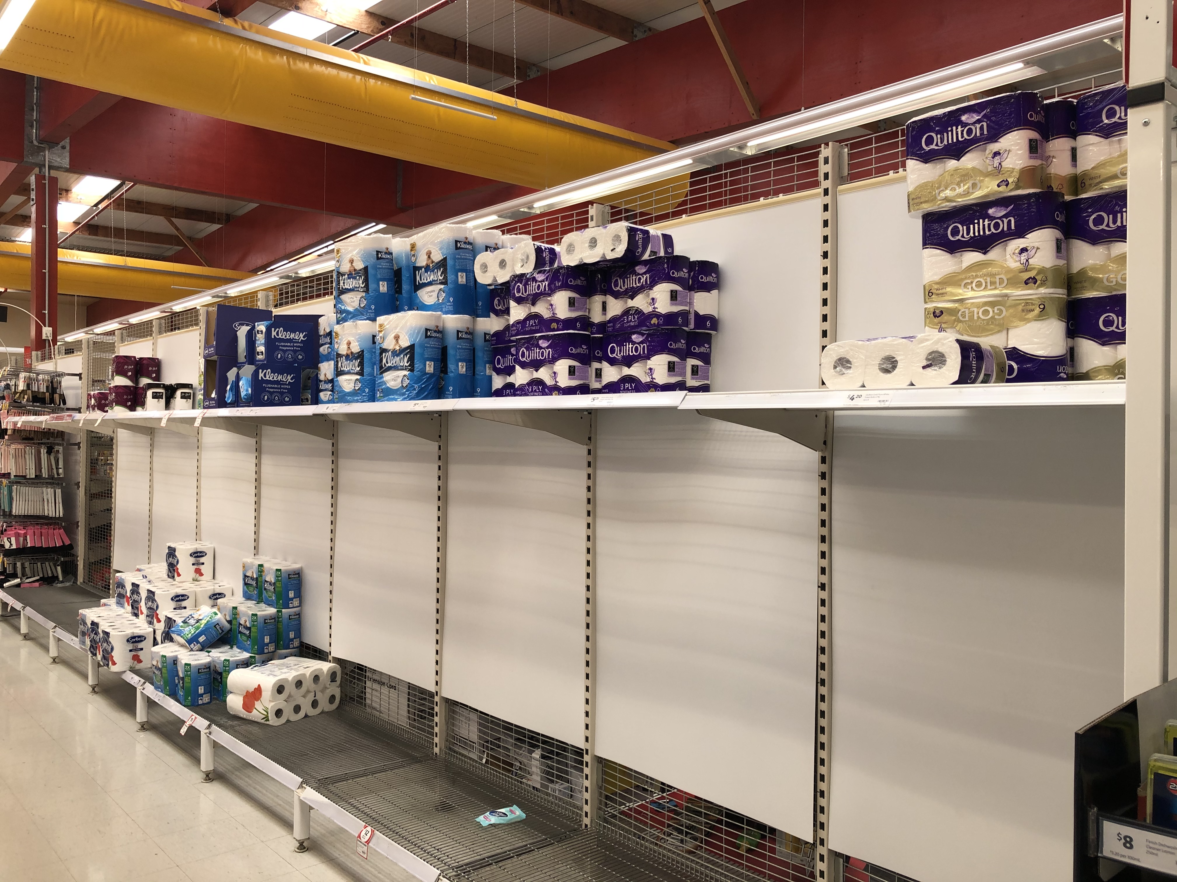 Toilet paper shelves emptied in Sydney supermarket.