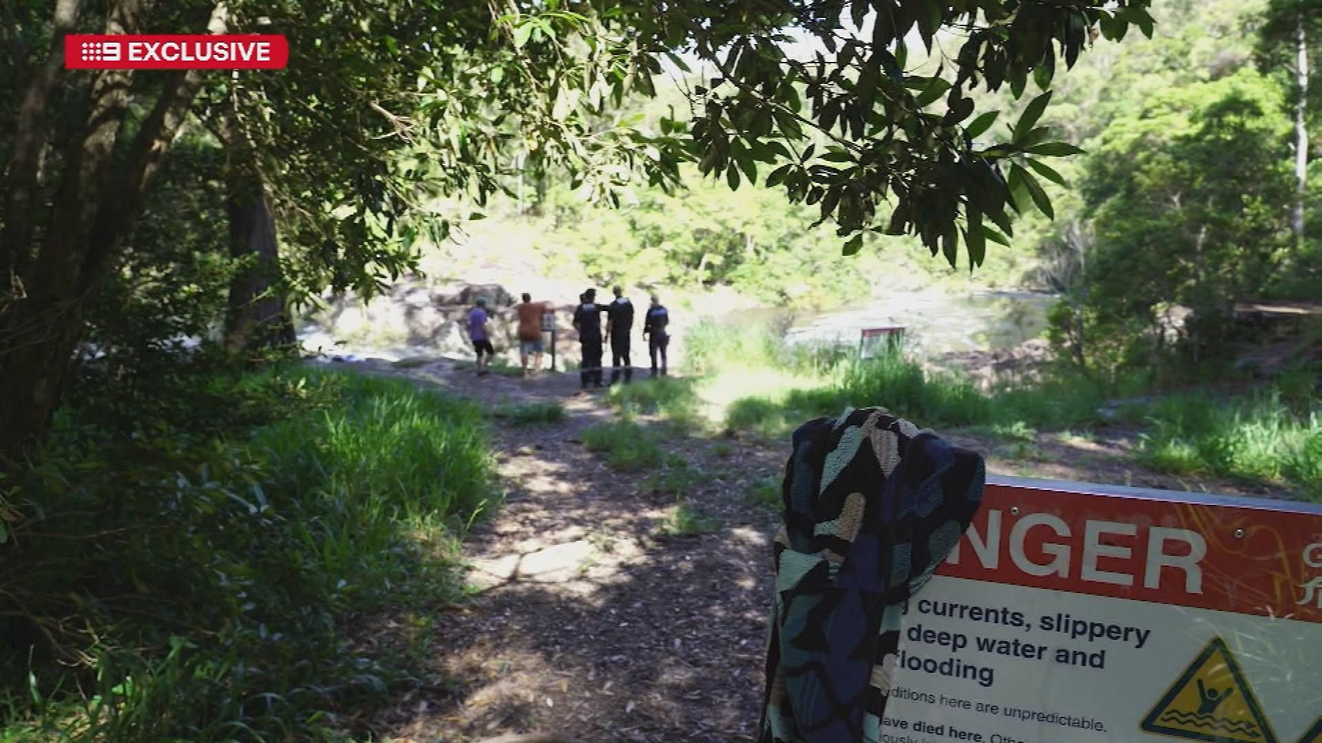 A 17-year-old girl has drowned and a search is underway for a 17-year-old man who went in to help at a swimming spot on the Sunshine Coast.